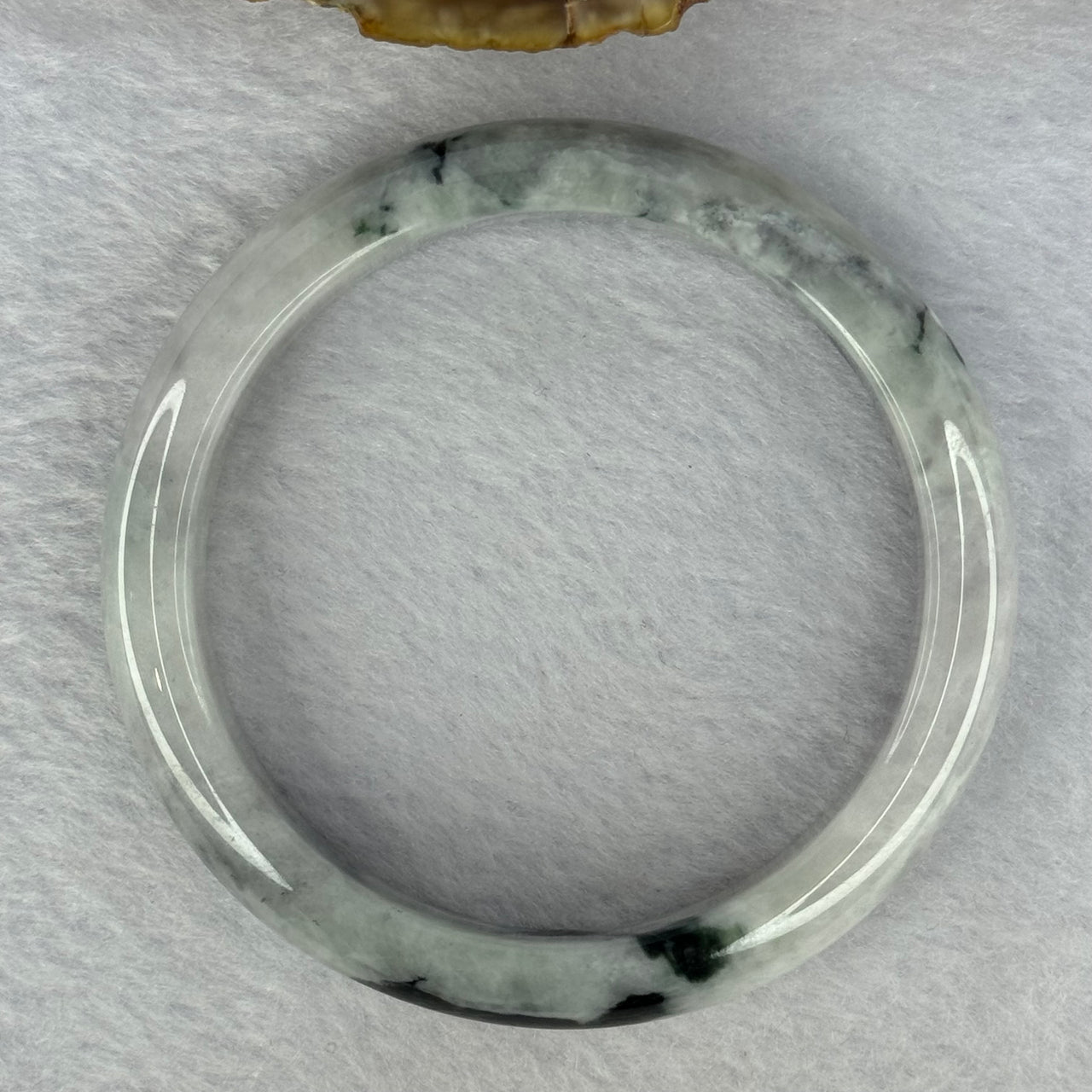 Type A Green Lavender with Dark Green Patches 50.67g Internal Diameter 57.5mm 12.6 by 8.2mm (Internal Lines) - Huangs Jadeite and Jewelry Pte Ltd