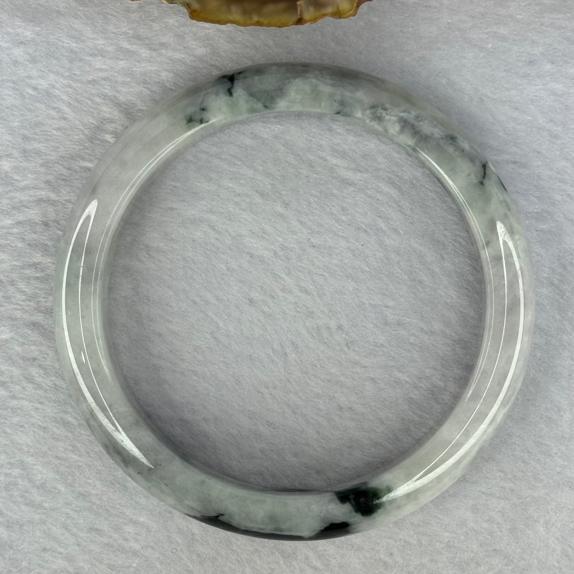 Type A Green Lavender with Dark Green Patches 50.67g Internal Diameter 57.5mm 12.6 by 8.2mm (Internal Lines) - Huangs Jadeite and Jewelry Pte Ltd