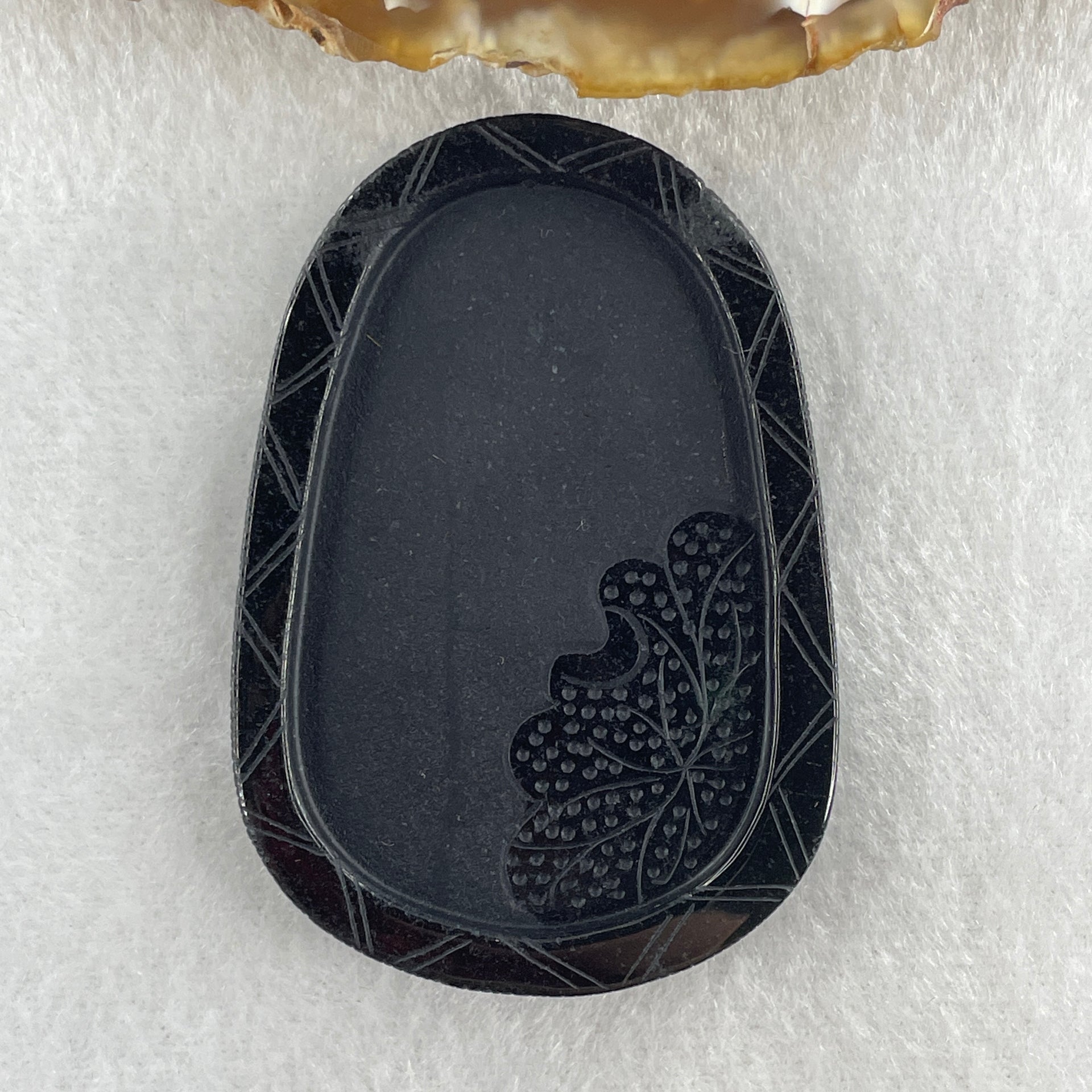 Type A Opaque to Partial Translucent Black Omphacite Jadeite Dragon Pendant 24.58g 58.2 by 40.3 by 8.2mm - Huangs Jadeite and Jewelry Pte Ltd