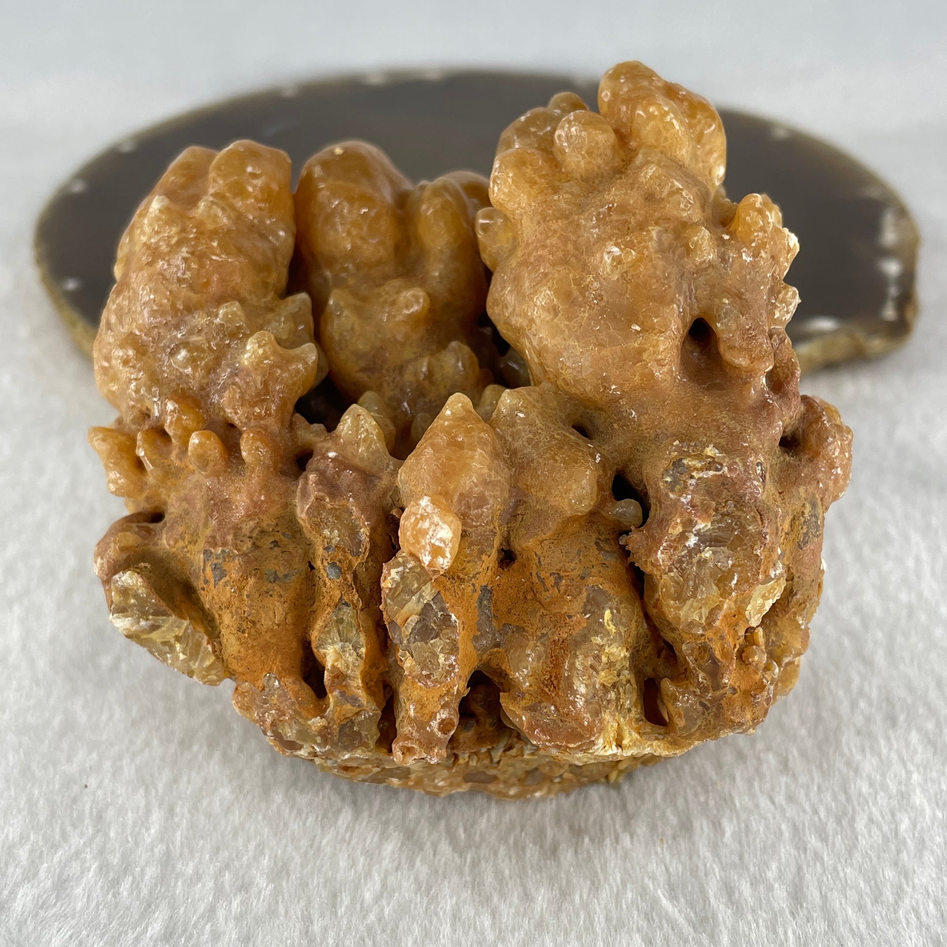 Natural Orange Calcite Rough Display with Wooden Stand 540.6g 109.7 by 94.1 by 123.0mm - Huangs Jadeite and Jewelry Pte Ltd