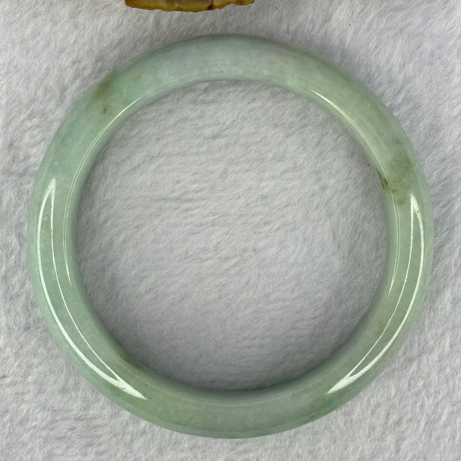 Type A Light Green with Bright Green Patches Jadeite Bangle 78.00g Internal Diameter 61.7mm 14.5 by 9.9mm (Very Slight External Rough) - Huangs Jadeite and Jewelry Pte Ltd