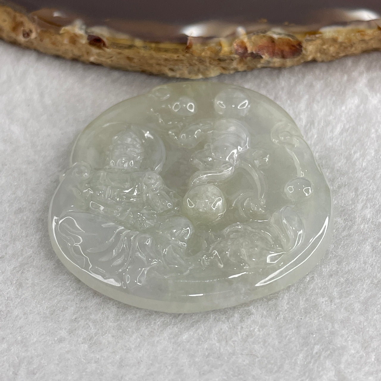 Natural Type A Semi Icy Colorless Jadeite Guan Yin with Lotus Flower Pendant 23.37g 52.8 by 46.7 by 5.2mm - Huangs Jadeite and Jewelry Pte Ltd