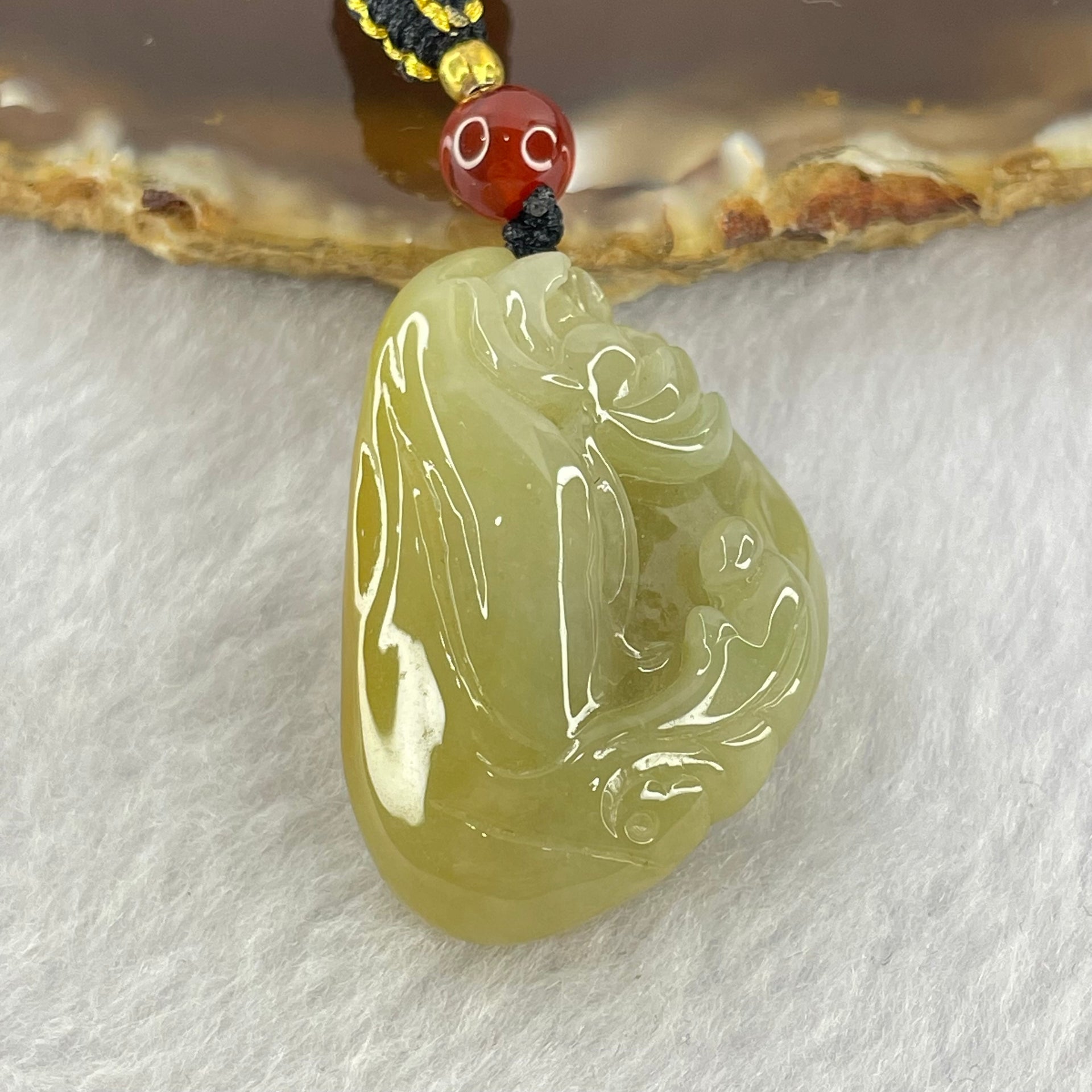 Type A Yellow with Green Jadeite Flower and Gui Ren Benefactor Pendant 18.03g 31.9 by 22.7 by 13.8mm - Huangs Jadeite and Jewelry Pte Ltd