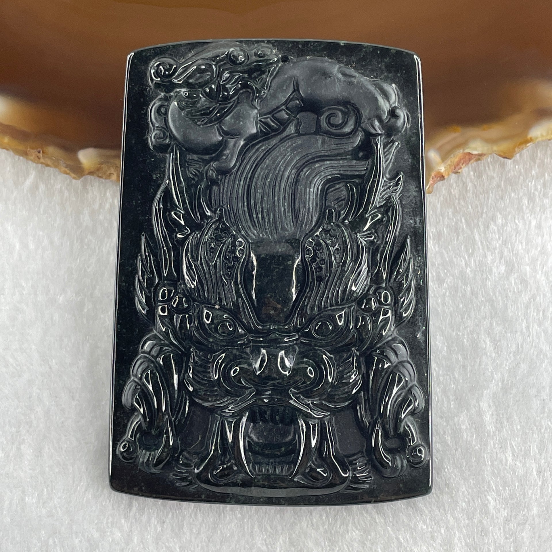 Type A Opaque to Partial Translucent Black Omphacite Jadeite Dragon with pixiu Pendant 45.42g 66.0 by 45.5 by 9.2mm - Huangs Jadeite and Jewelry Pte Ltd