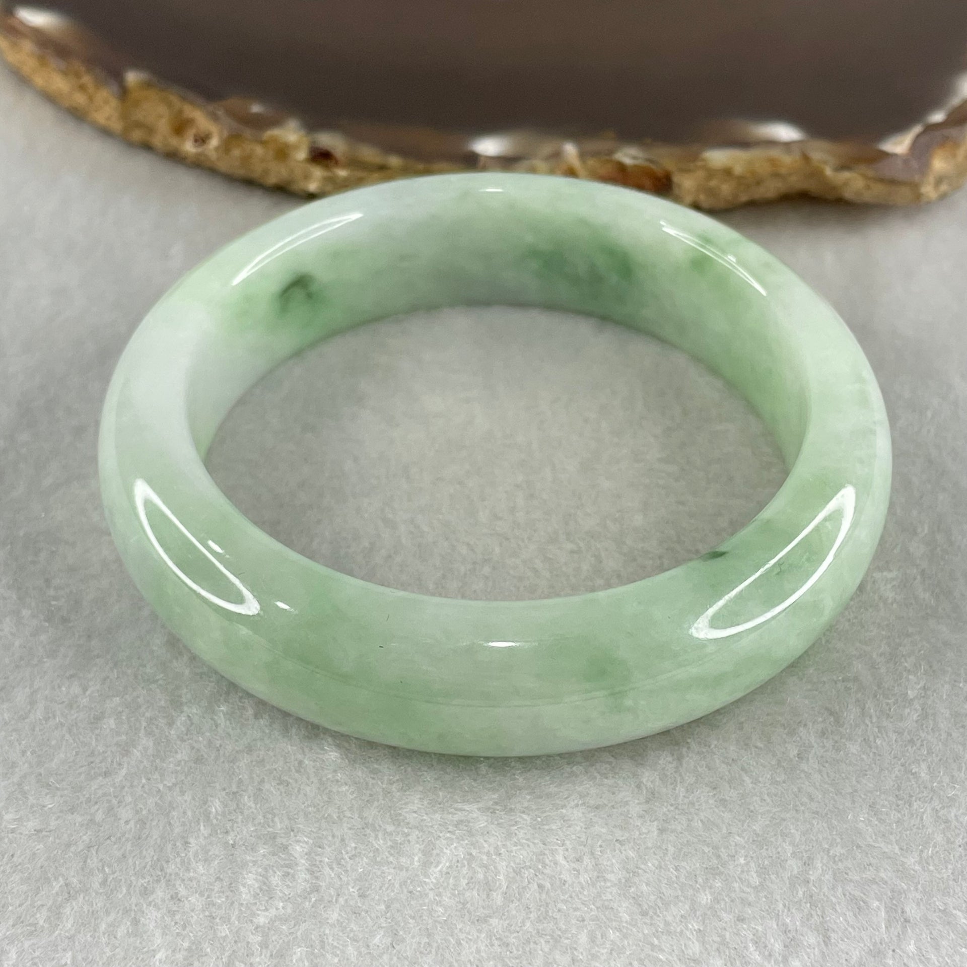 Type A Light Green Faint Lavender with Emerald Green Patches Jadeite Bangle 72.91g Inner Diameter 56.9mm 15.1 by 9.3mm (Very Slight Internal Lines) - Huangs Jadeite and Jewelry Pte Ltd