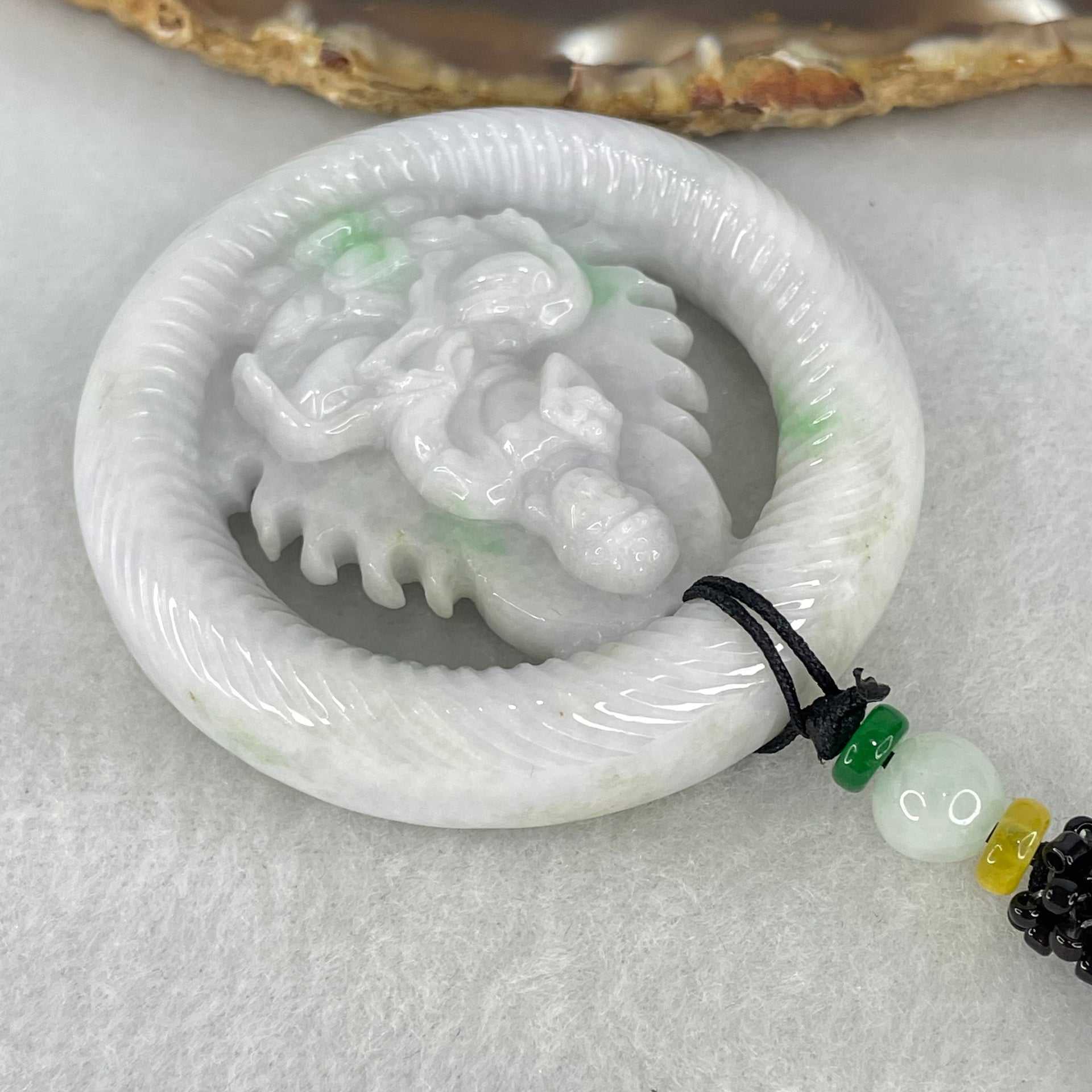 Type A Light Lavender Green Jadeite Buddha Ping An Kou Donut Pendant 74.33g 56.4 by 13.6mm - Huangs Jadeite and Jewelry Pte Ltd