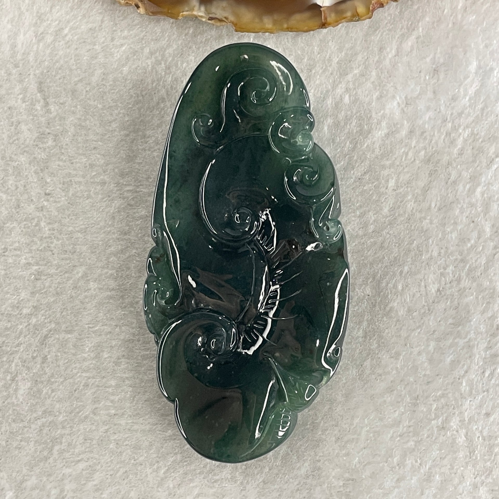 Certified Natural Type A Semi icy Blueish Green Jadeite Ruyi Double Side with Dragon Head Pendant 45.00g 69.8 by 34.0 by 13.9mm - Huangs Jadeite and Jewelry Pte Ltd