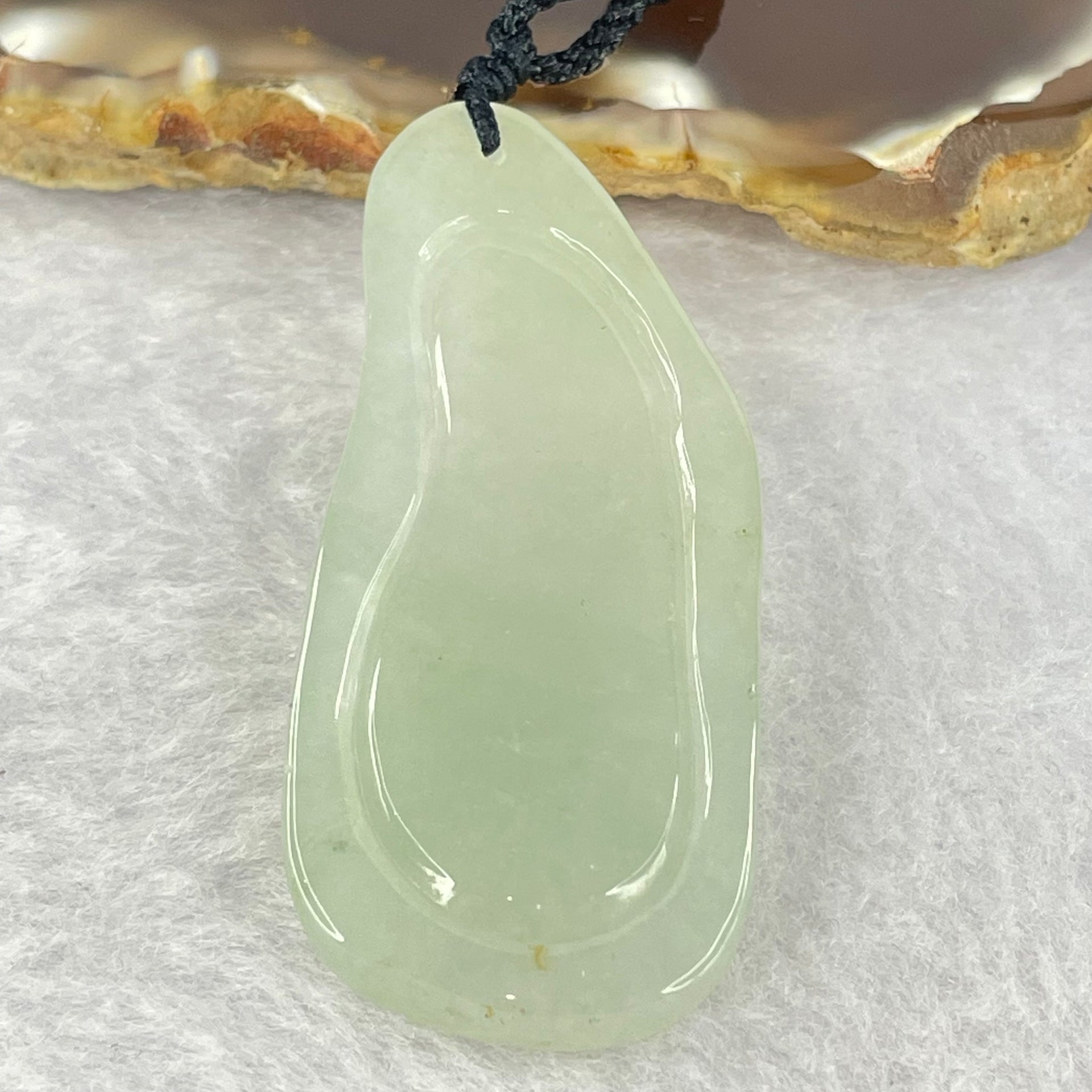 Type A Semi Icy Green Jadeite Guan Yin Pendent 11.98g 48.0 by 21.3 by 5.4mm - Huangs Jadeite and Jewelry Pte Ltd