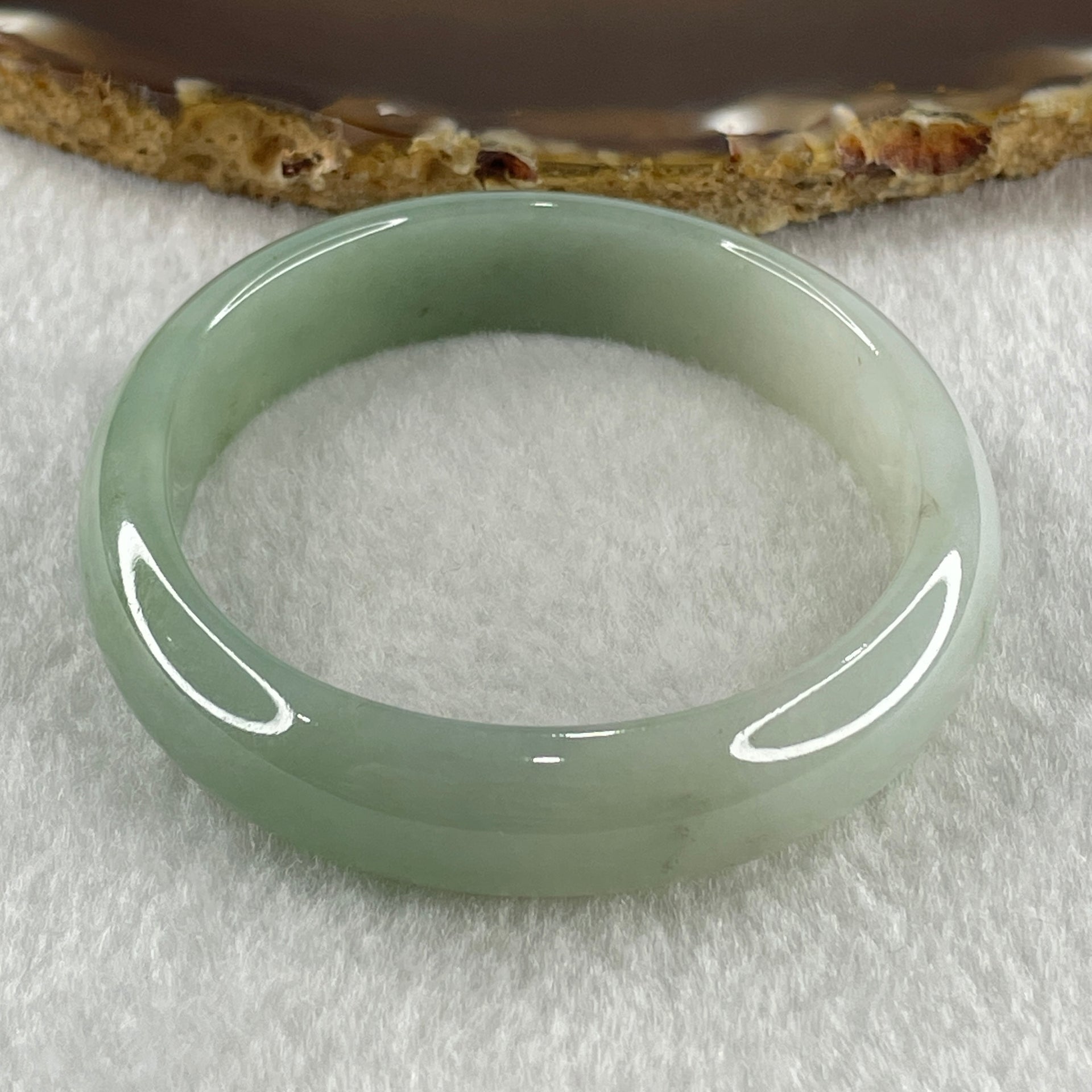 Natural Type A Jelly Light to Faint Green Jadeite Oval Bangle 36.74g Inner Diameter 55.0mm 12.0 by 6.5mm (Close to Perfect) - Huangs Jadeite and Jewelry Pte Ltd