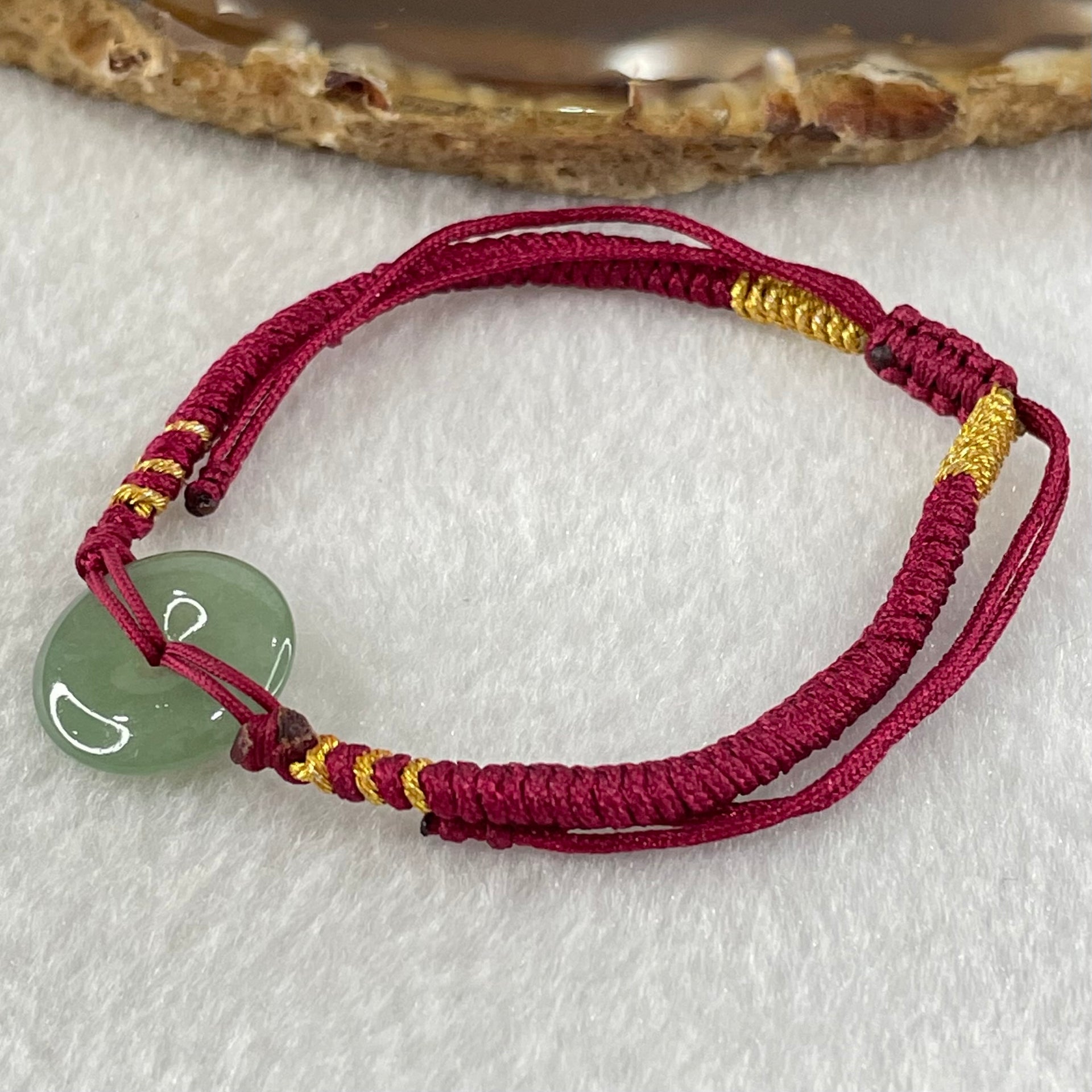 Type A Blueish Green Jadeite Ping An Kou Donut In String Bracelet 2.30g 14.6 by 3.4mm - Huangs Jadeite and Jewelry Pte Ltd