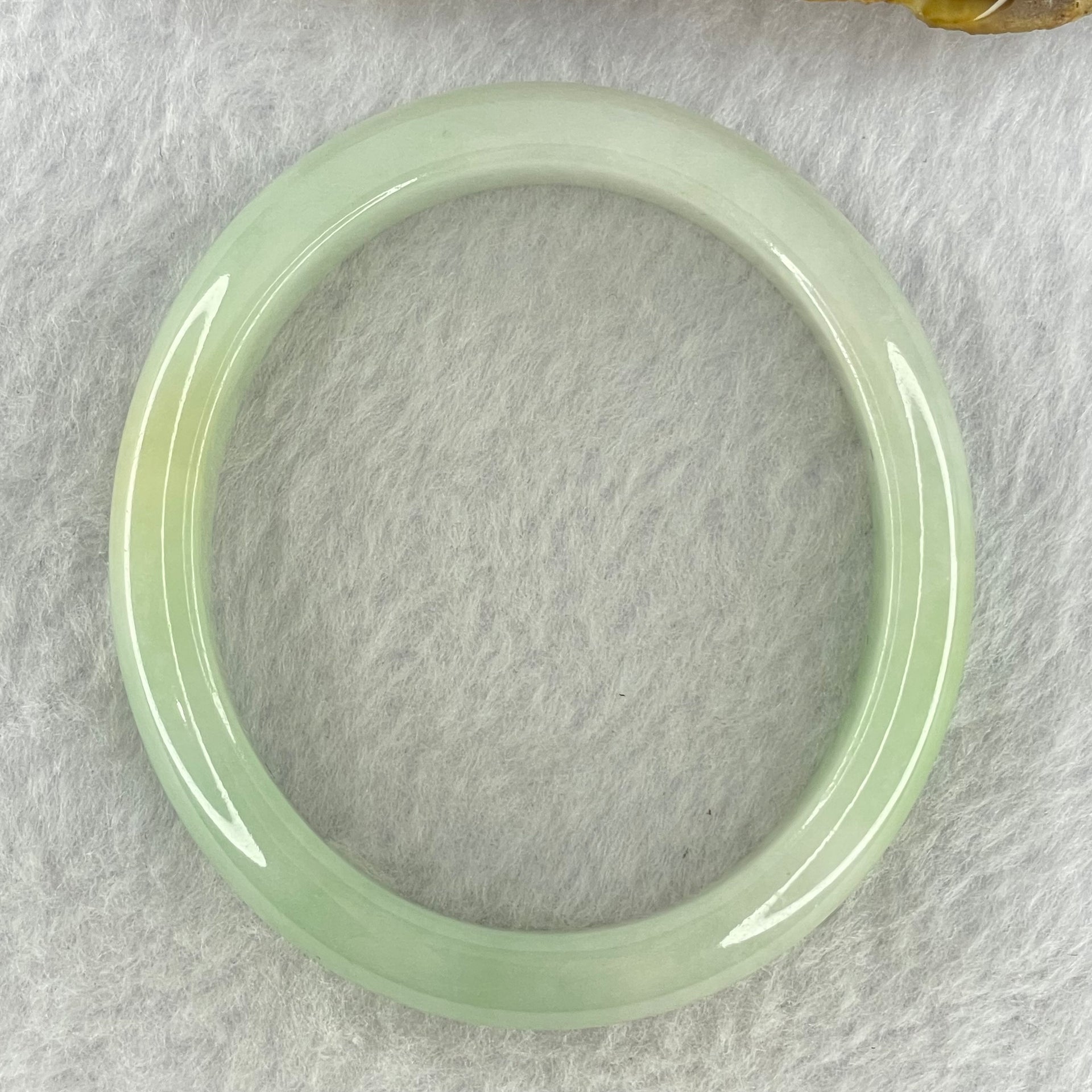 Type A Light Green Jadeite Oval Bangle Internal Diameter 56.2mm 40.54g 11.1 by 7.2mm (Slight Internal Line) - Huangs Jadeite and Jewelry Pte Ltd