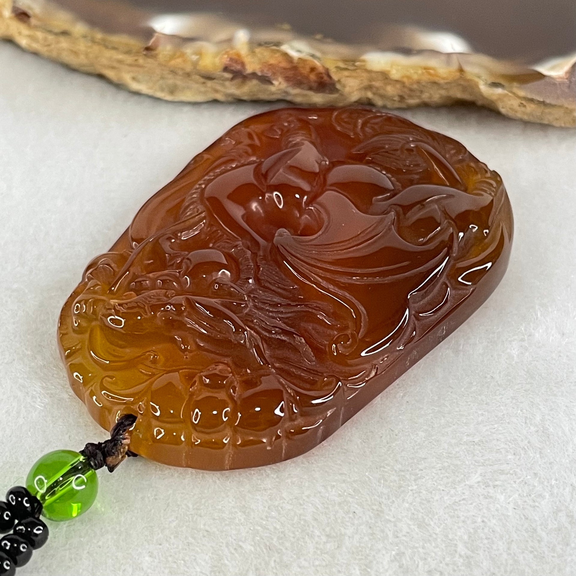 Natural Brownish Red Chalcedony Dragon Pendant 27.687g 54.1 by 38.5 by 9.1mm in Crystal Necklace 65cm - Huangs Jadeite and Jewelry Pte Ltd