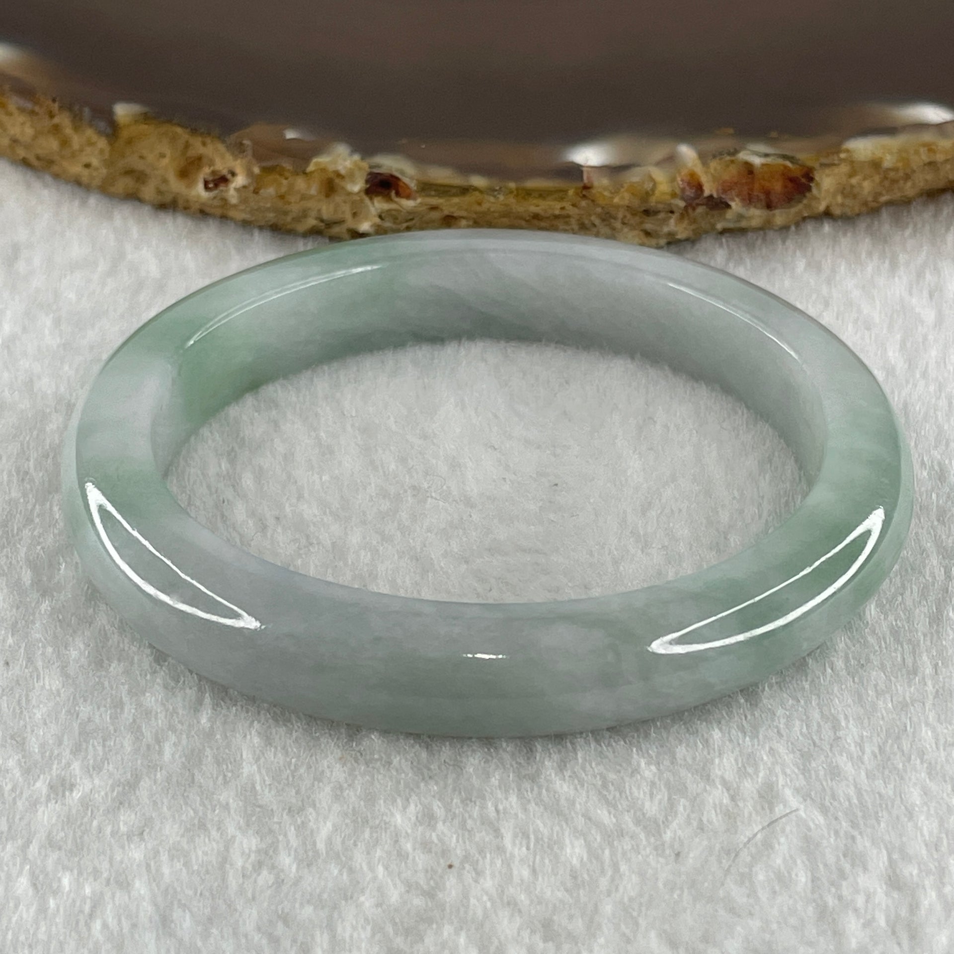 Type A Natural Light Green Jadeite Oval Bangle 34.44g Inner Diameter 52.2mm 9.2 by 8.0mm (Internal Lines) - Huangs Jadeite and Jewelry Pte Ltd