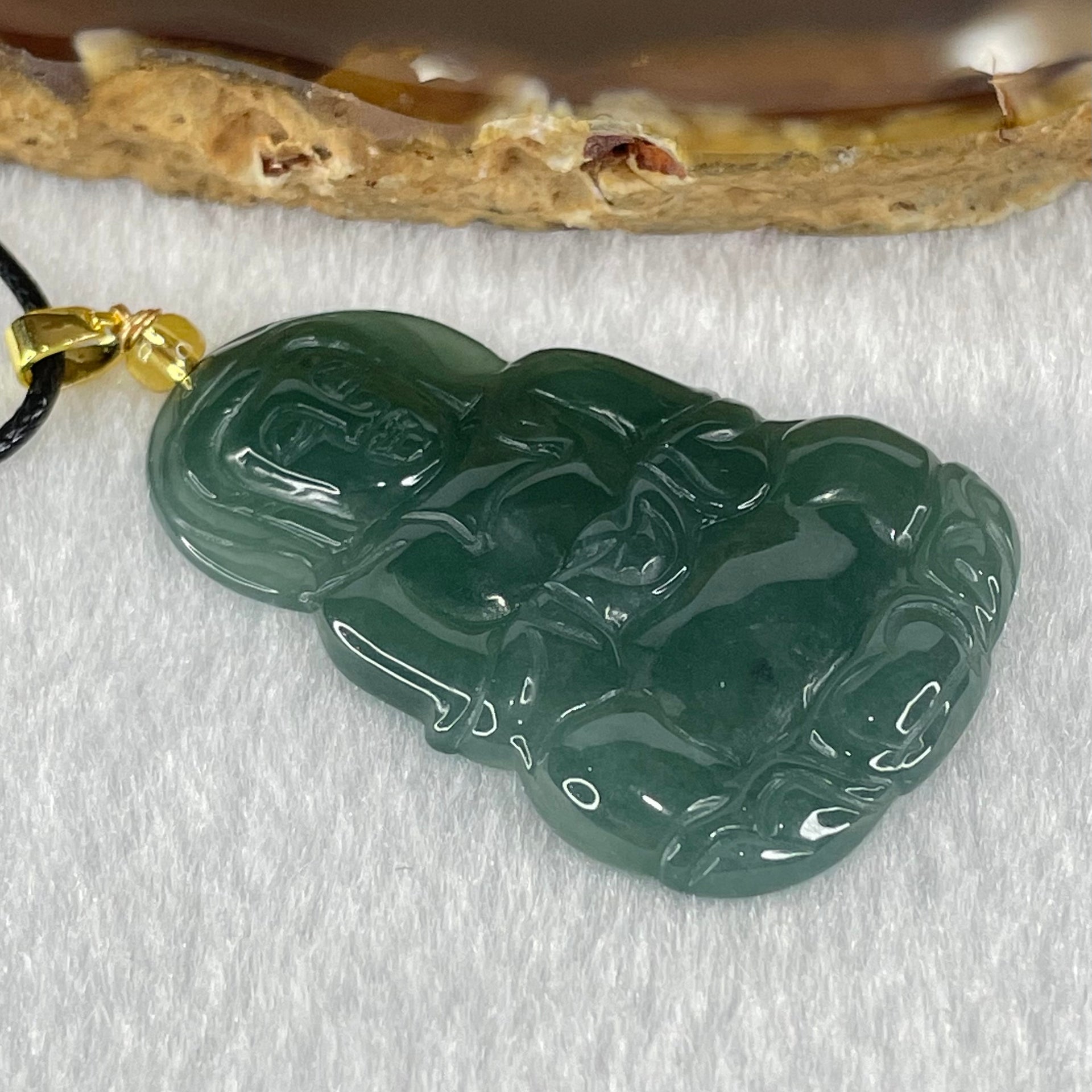 Type A Icy Blueish Green Jadeite Guan Yin Pendant Necklace 7.22g 40.9 by 26.8 by 4.0mm - Huangs Jadeite and Jewelry Pte Ltd