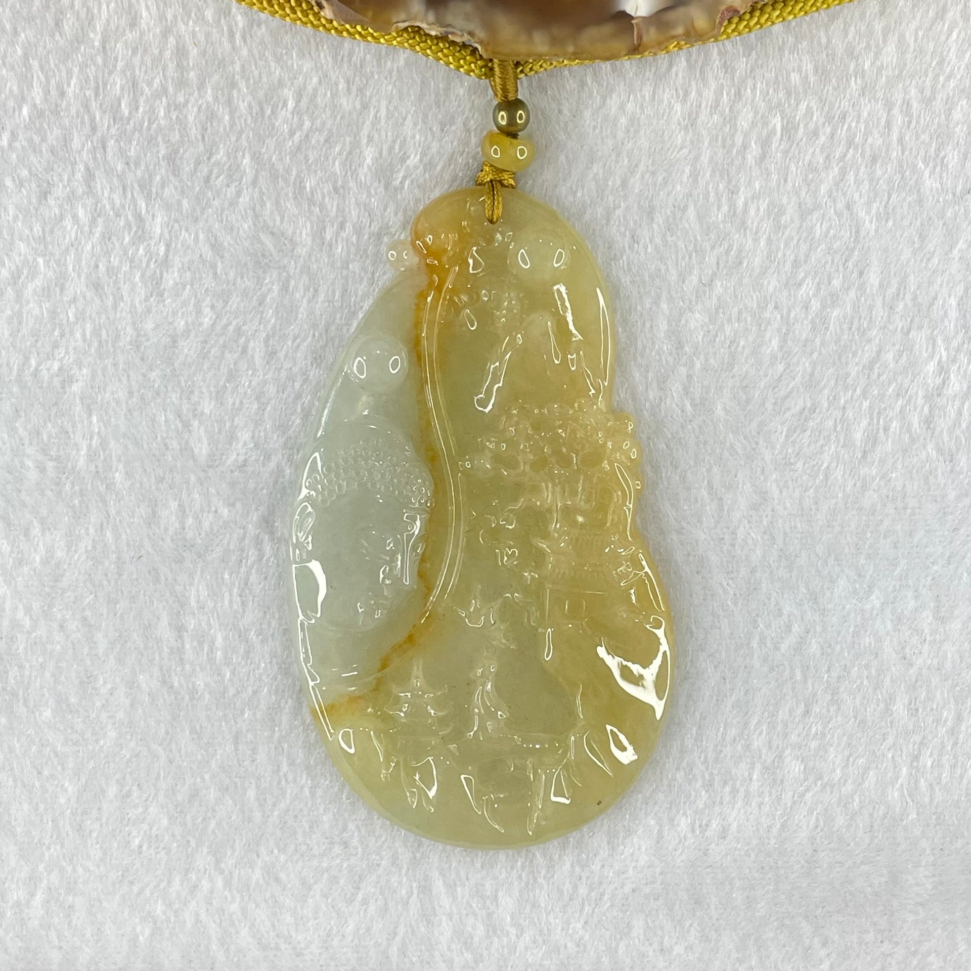 Grandmaster Type A Yellow with Faint Green and Red Jadeite Shan Shui with Buddha Pendant 22.54g 69.8 by 39.7 by 4.8mm - Huangs Jadeite and Jewelry Pte Ltd