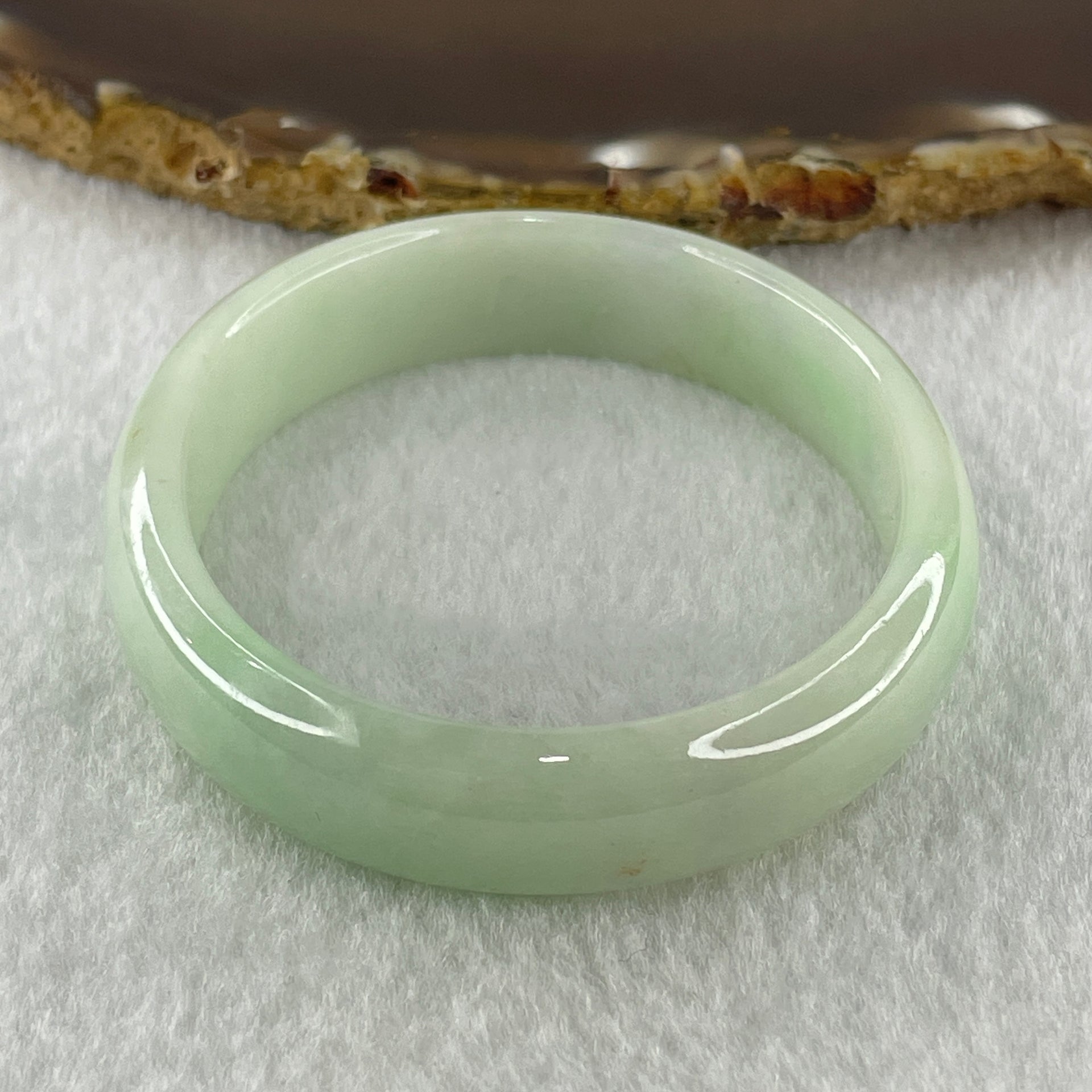 Natural Type A Light Green Jadeite Oval Bangle 36.17g Inner Diameter 54.6mm 12.5 by 6.4mm (Internal Lines) - Huangs Jadeite and Jewelry Pte Ltd