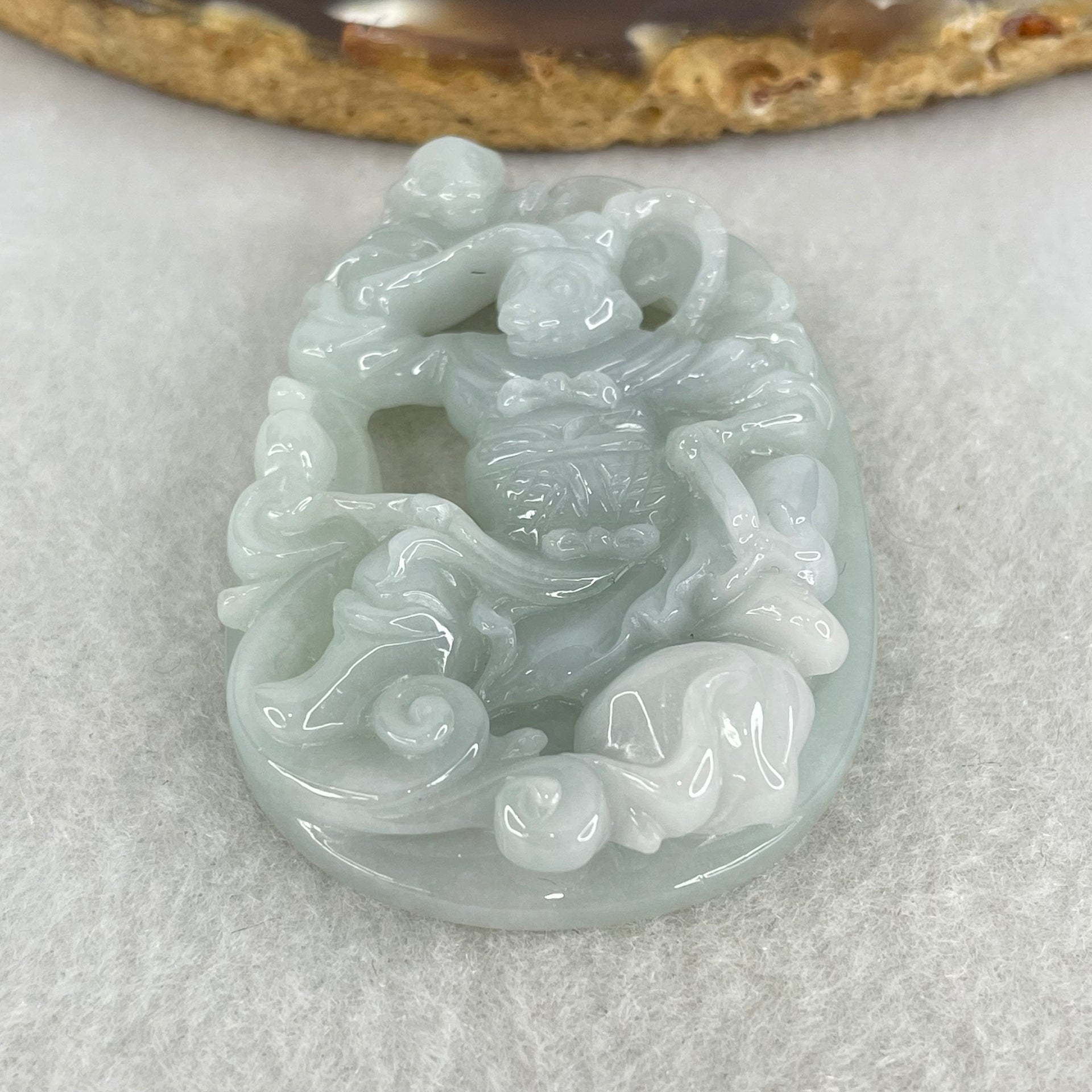 Type A Light Sky Blue Jadeite Sun Wu Kong Pendant 27.49g 52.8 by 37.1 by 11.0mm - Huangs Jadeite and Jewelry Pte Ltd