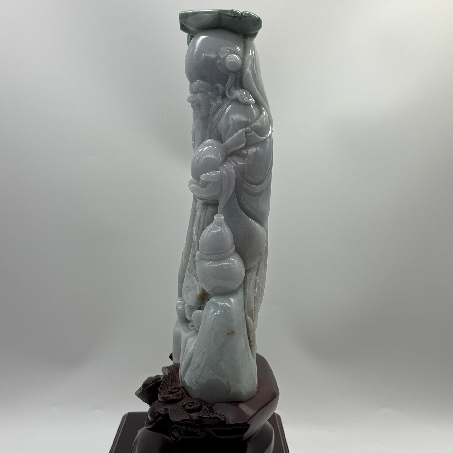 Type A Lavender, Green & Yellow Jade Jadeite Shou Xing Gong with Wooden Stand 财源滚滚 健康长寿 - 3.93kg Dimensions with Stand: 39 by 25 by 15cm Jade Dimensions: 27 by 15 by 7cm - Huangs Jadeite and Jewelry Pte Ltd