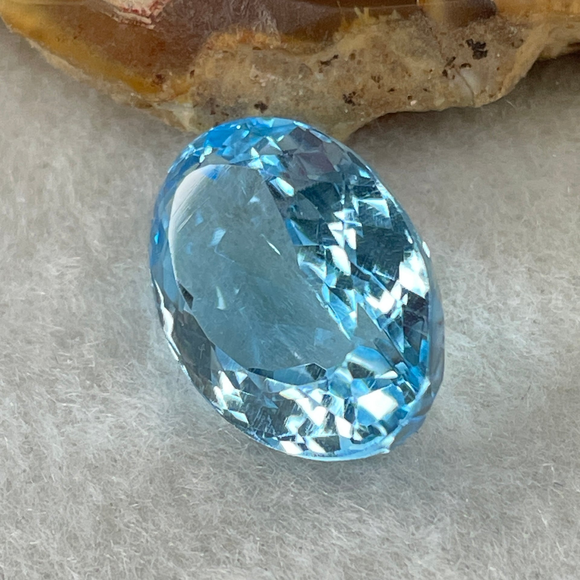 Natural Sky Blue Topaz Oval Shape 15.89ct 18.0 by 12.4 by 8.1mm - Huangs Jadeite and Jewelry Pte Ltd