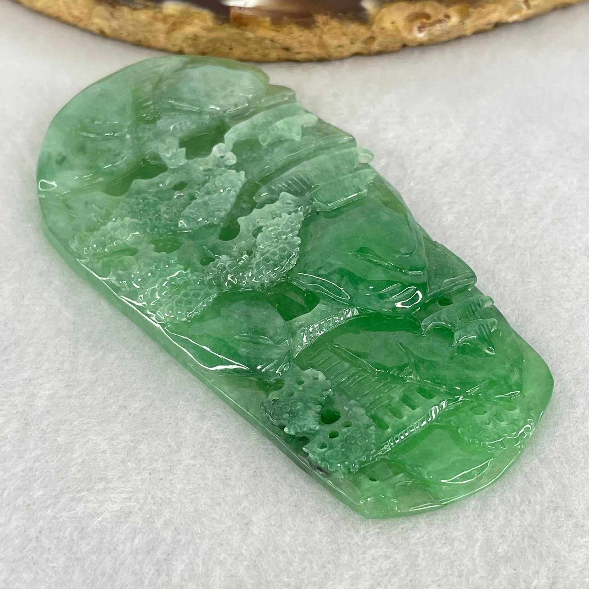 Type A Semi Icy Bright Green Jadeite Double Sided Shan Shui with Gui Ren Benefactor Pendant 47.64g 76.5 by 39.9 by 9.0mm - Huangs Jadeite and Jewelry Pte Ltd