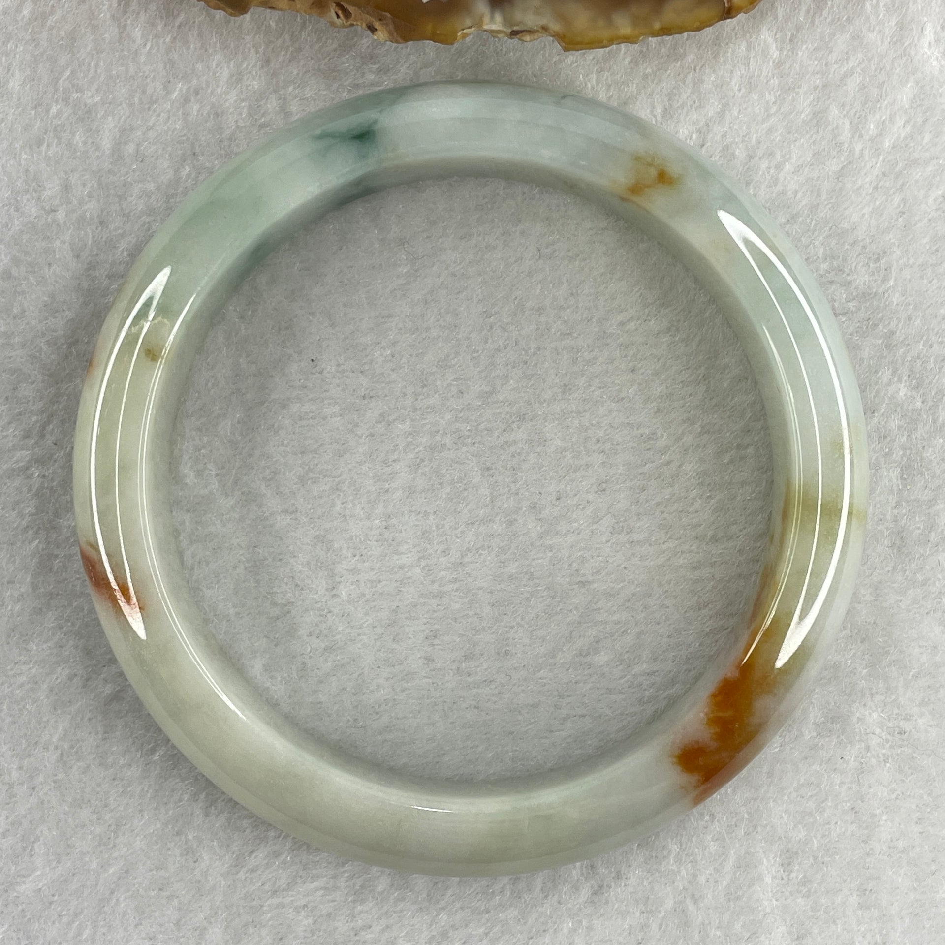Type A Natural Light Green with Spicy Green and Brownish Patches Jadeite Bangle 55.09g Inner Diameter 57.5mm 12.7 by 9.0mm (Slight External Rough) - Huangs Jadeite and Jewelry Pte Ltd
