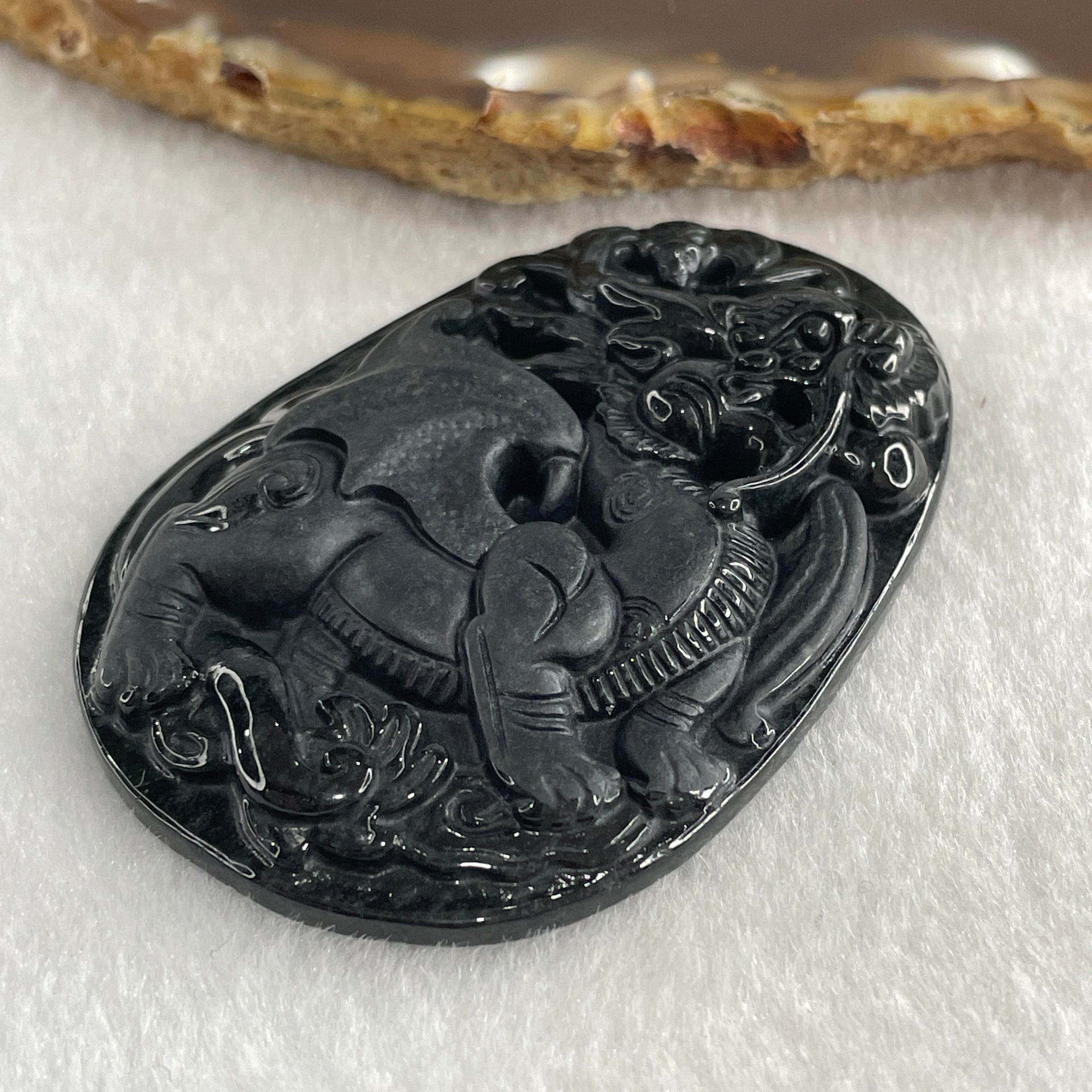 Type A Opaque to Partial Translucent Black Omphacite Jadeite Flying Pixiu Pendant 27.31g 61.2 by 42.5 by 9.3mm - Huangs Jadeite and Jewelry Pte Ltd