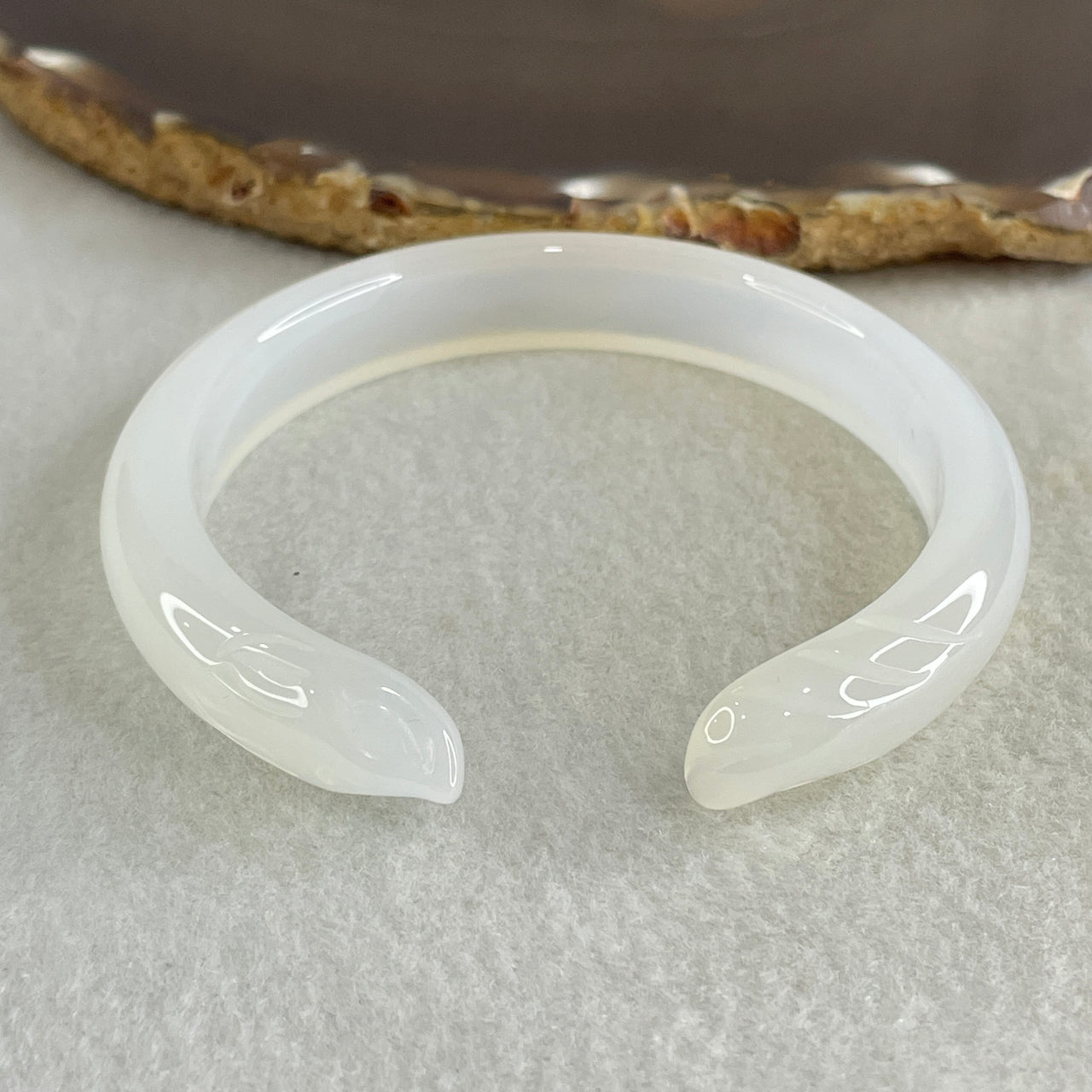 Natural White Agate Fox Bange Internal Dimeter 58.6mm 30.60g 10.9 by 8.9mm - Huangs Jadeite and Jewelry Pte Ltd