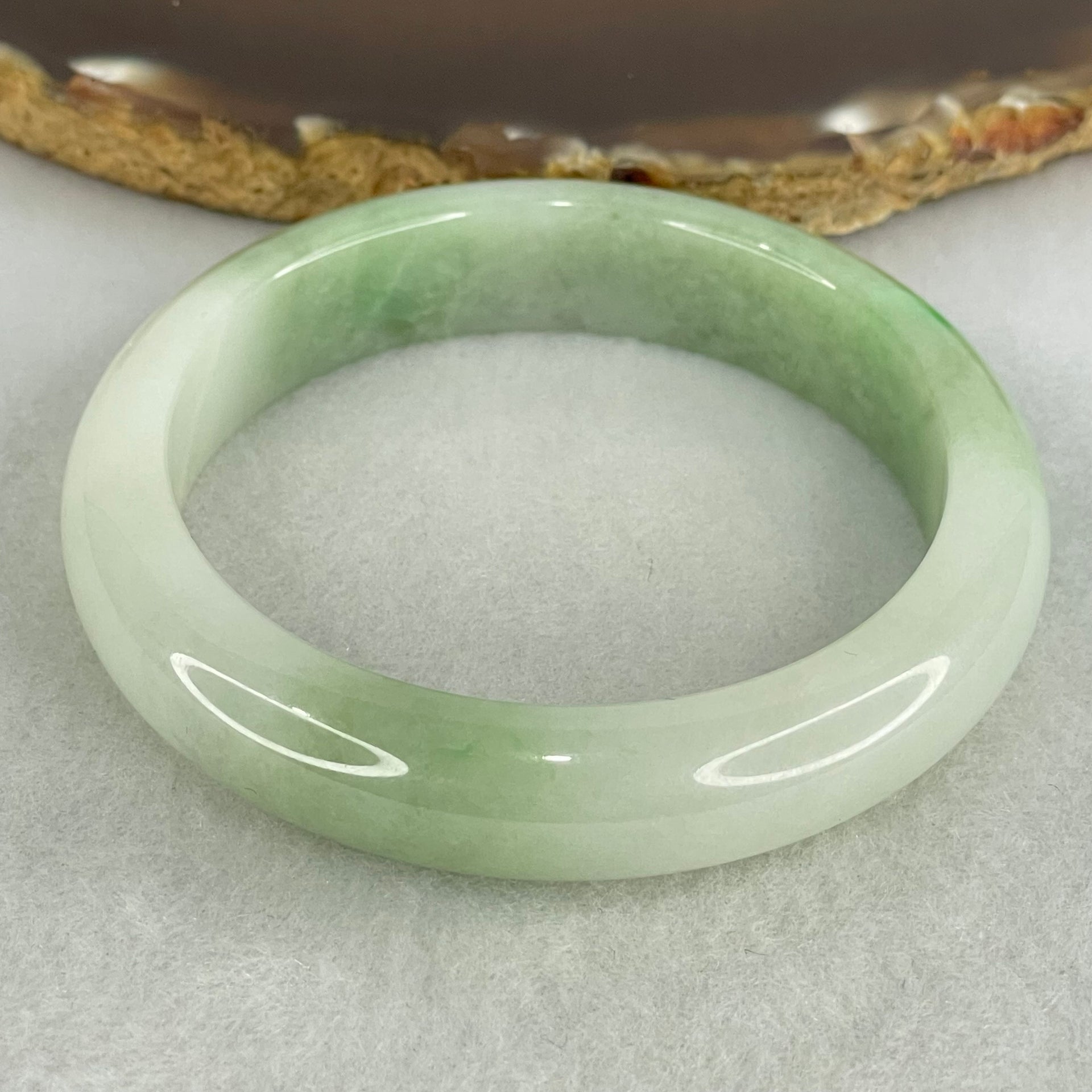 Type A Light Green with Green Patches Jadeite Bangle Internal Diameter 53.8mm 50.57g 12.3 by 7.9mm (Internal Lines) - Huangs Jadeite and Jewelry Pte Ltd
