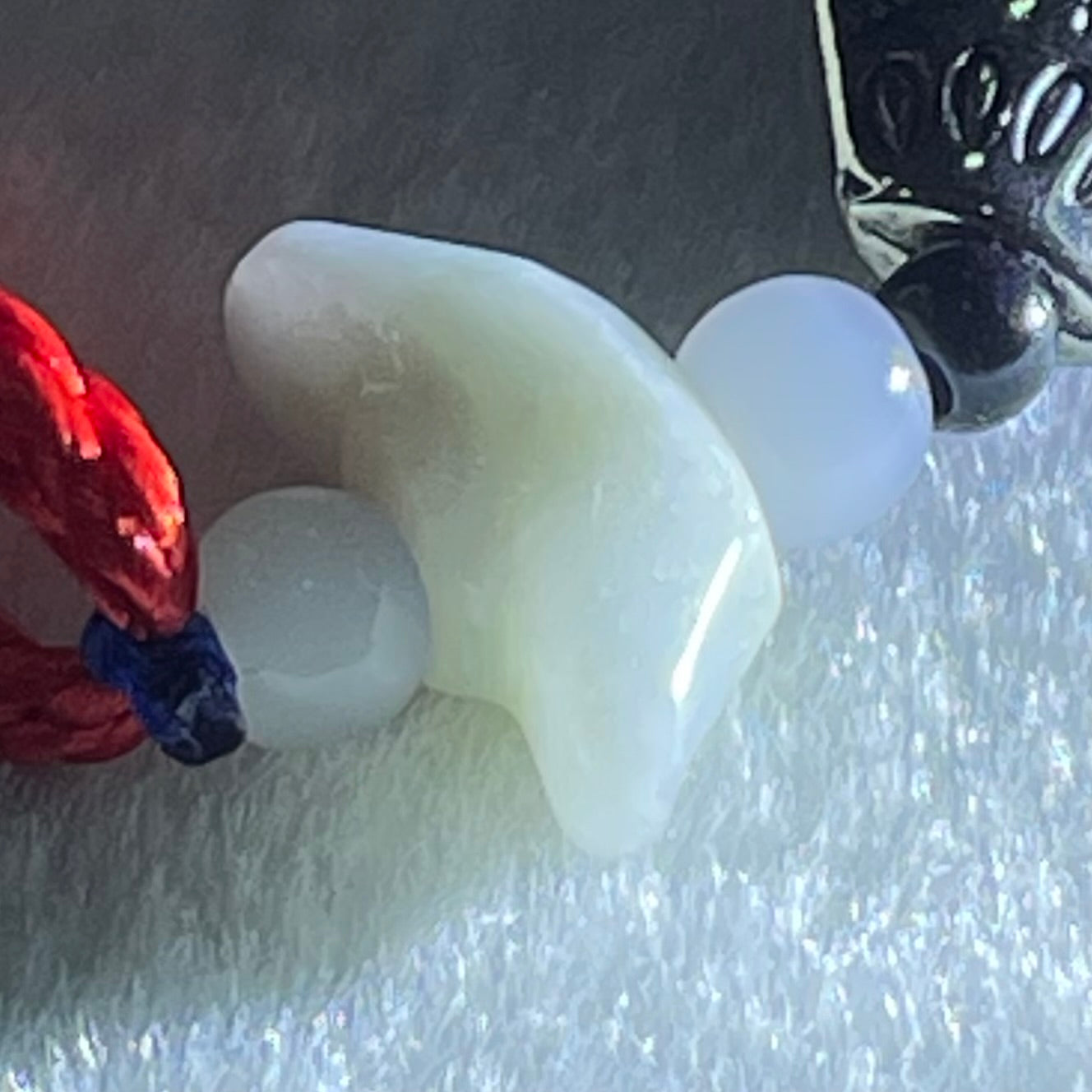 Type A Light Lavender Yellow Jadeite Yuan Bao Ingot in Red Blue String Display 4.75g 7.1 by 17.3 by 6.7mm - Huangs Jadeite and Jewelry Pte Ltd