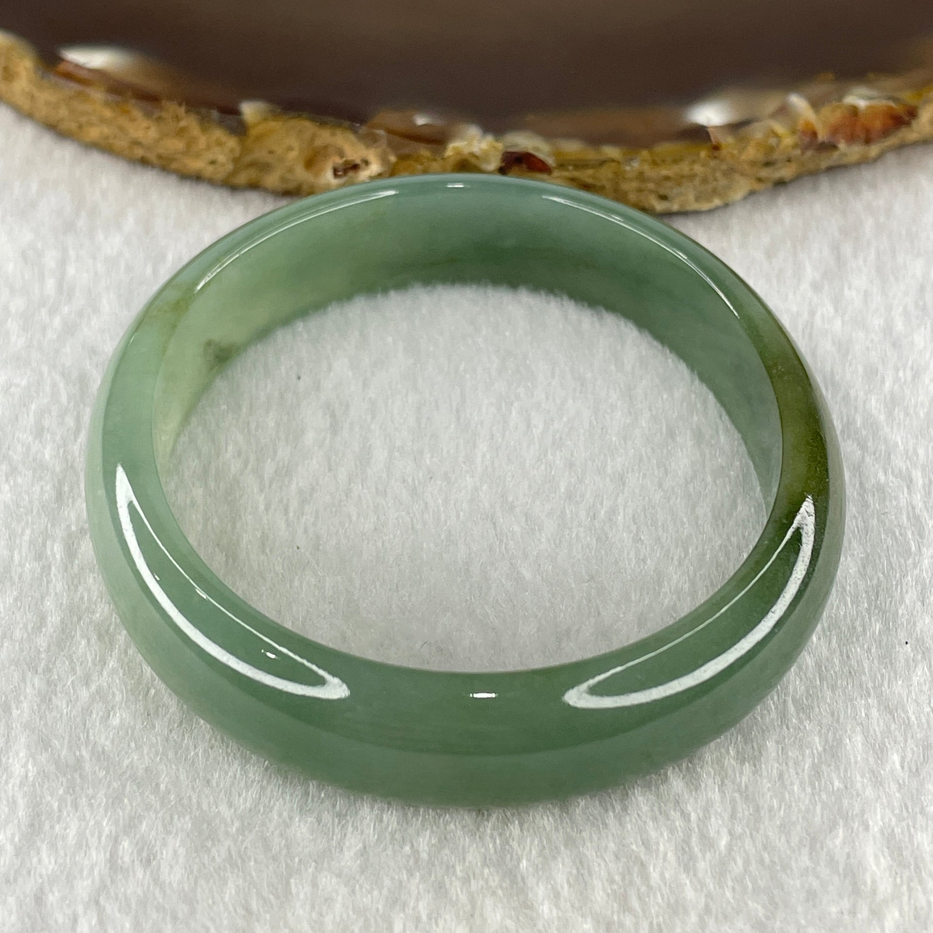 Natural Type A Jelly Full Green Jadeite Oval Bangle 31.63g Inner Diameter 54.9mm 11.6 by 5.6mm (Slight Internal Lines) - Huangs Jadeite and Jewelry Pte Ltd