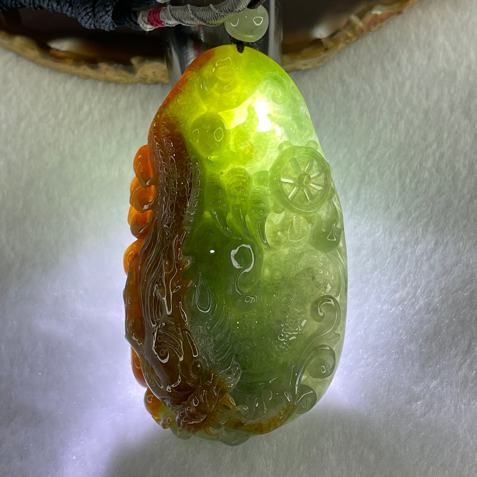 Grand Master Type A Light Green with Yellow Patches Jadeite Dragon Double Side Pendant 100.73g 35.0 by 43.3 by 20.9mm - Huangs Jadeite and Jewelry Pte Ltd