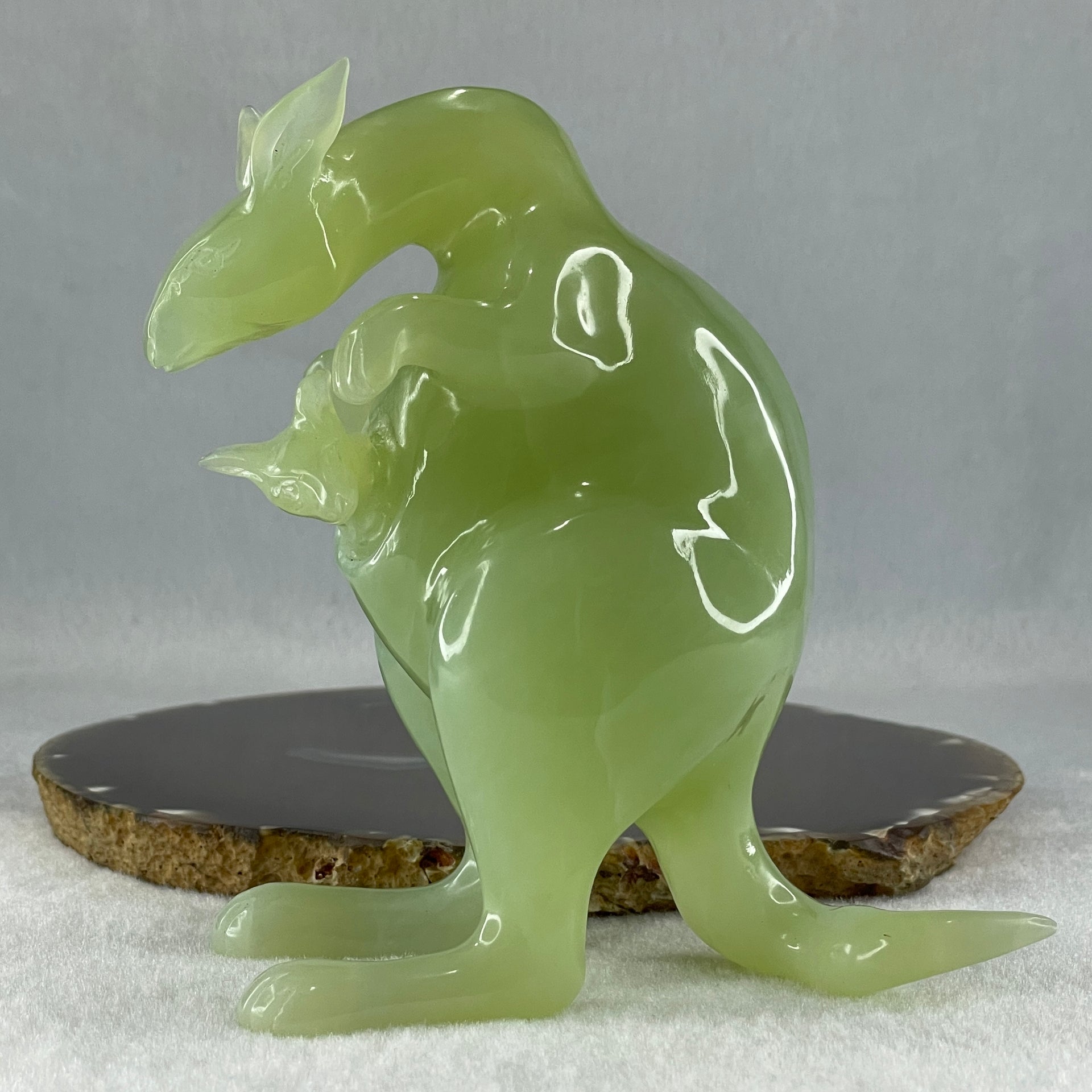 Natural Green Serpentine Kangaroo With Baby with Wooden Stand Display 569.6g 140.0 by 85.4 by 145.0mm - Huangs Jadeite and Jewelry Pte Ltd