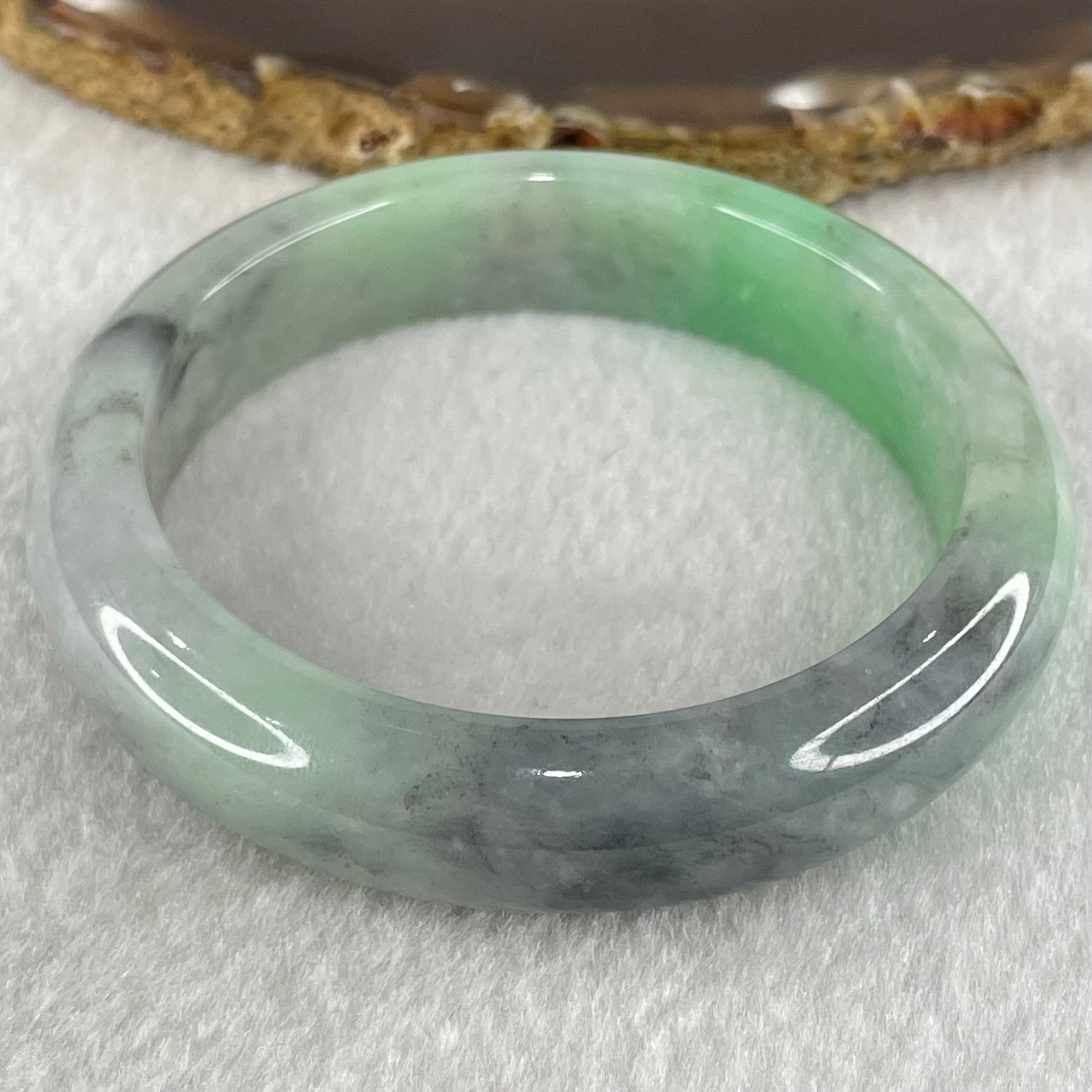 Type A Bright Green with Wuji Grey Black Patches Jadeite Bangle 58.90g Internal Diameter 54.7mm 13.3 by 8.5mm (Fine Internal Lines) - Huangs Jadeite and Jewelry Pte Ltd