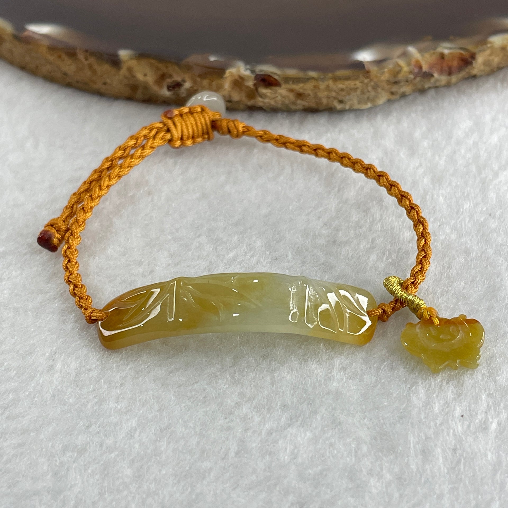 Natural Type A Yellowish with Light Green Jadeite Bamboo with Butterfly in String Bracelet 3.97g 14-16cm 39.1 by 9.1 by 2.9mm - Huangs Jadeite and Jewelry Pte Ltd