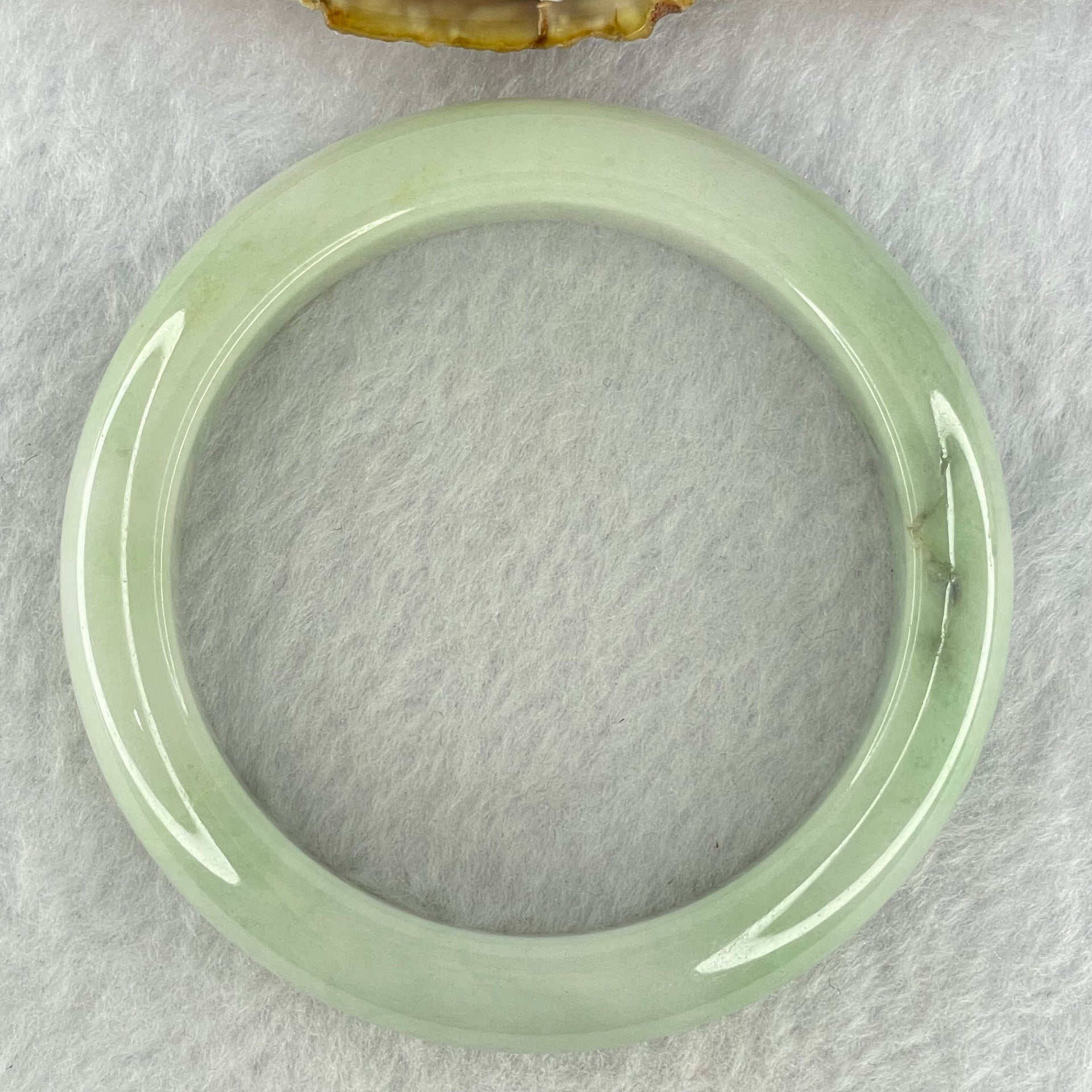 Type A Light Green Jadeite Bangle Internal Diameter 55.5mm 62.19g 12.8 by 8.9mm (External Rough) - Huangs Jadeite and Jewelry Pte Ltd