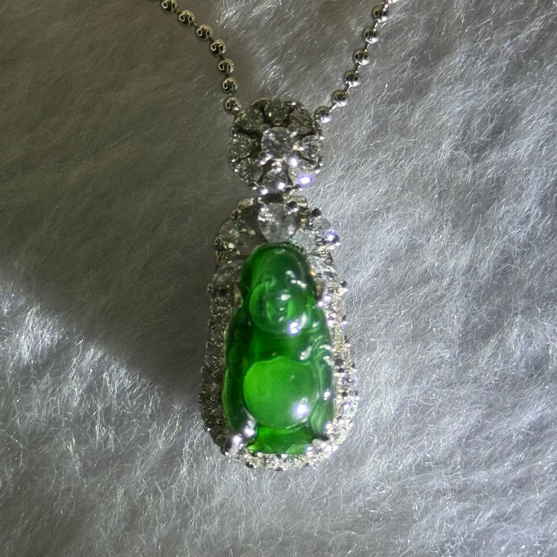 Type A Icy Green Omphasite Jadeite Milo Buddha 12.8 by 7.1 by 3.5mm with Crystals in S925 Sliver Necklace 2.87g - Huangs Jadeite and Jewelry Pte Ltd