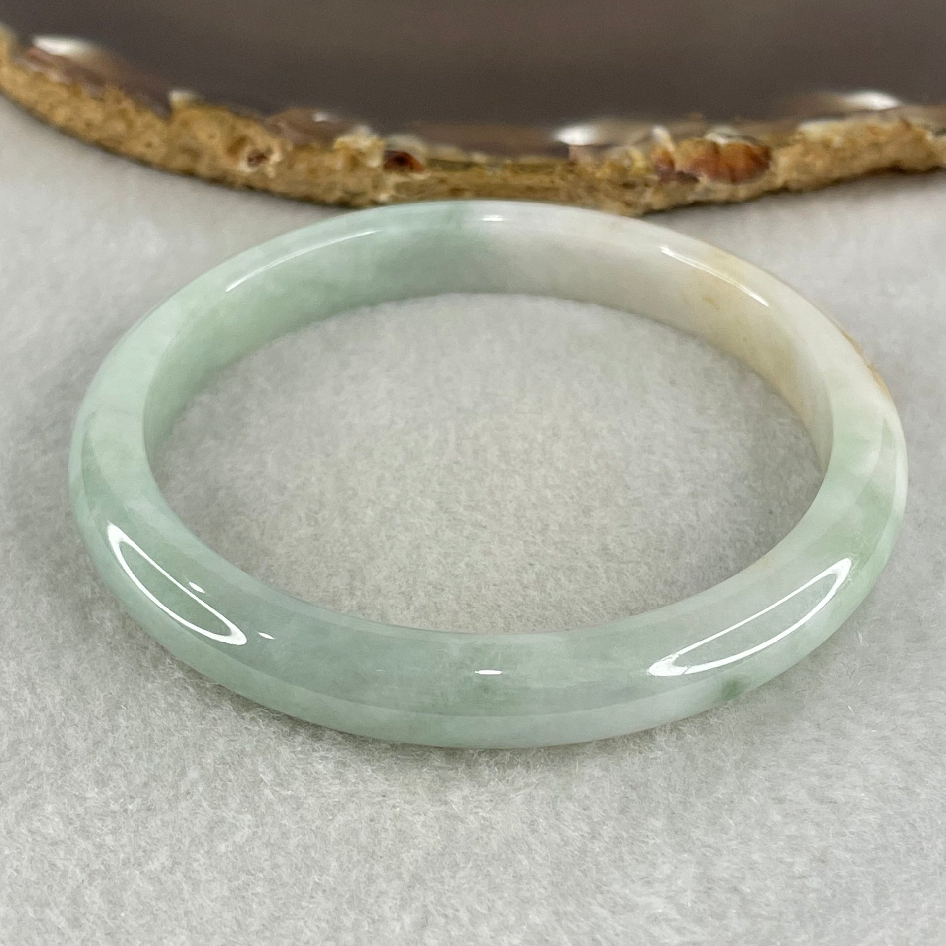 Type A Light Green with Brown Patches Jadeite Bangle 34.69g Inner Diameter 59.7mm 9.3 by 6.9mm (Very Slight Internal Lines) - Huangs Jadeite and Jewelry Pte Ltd