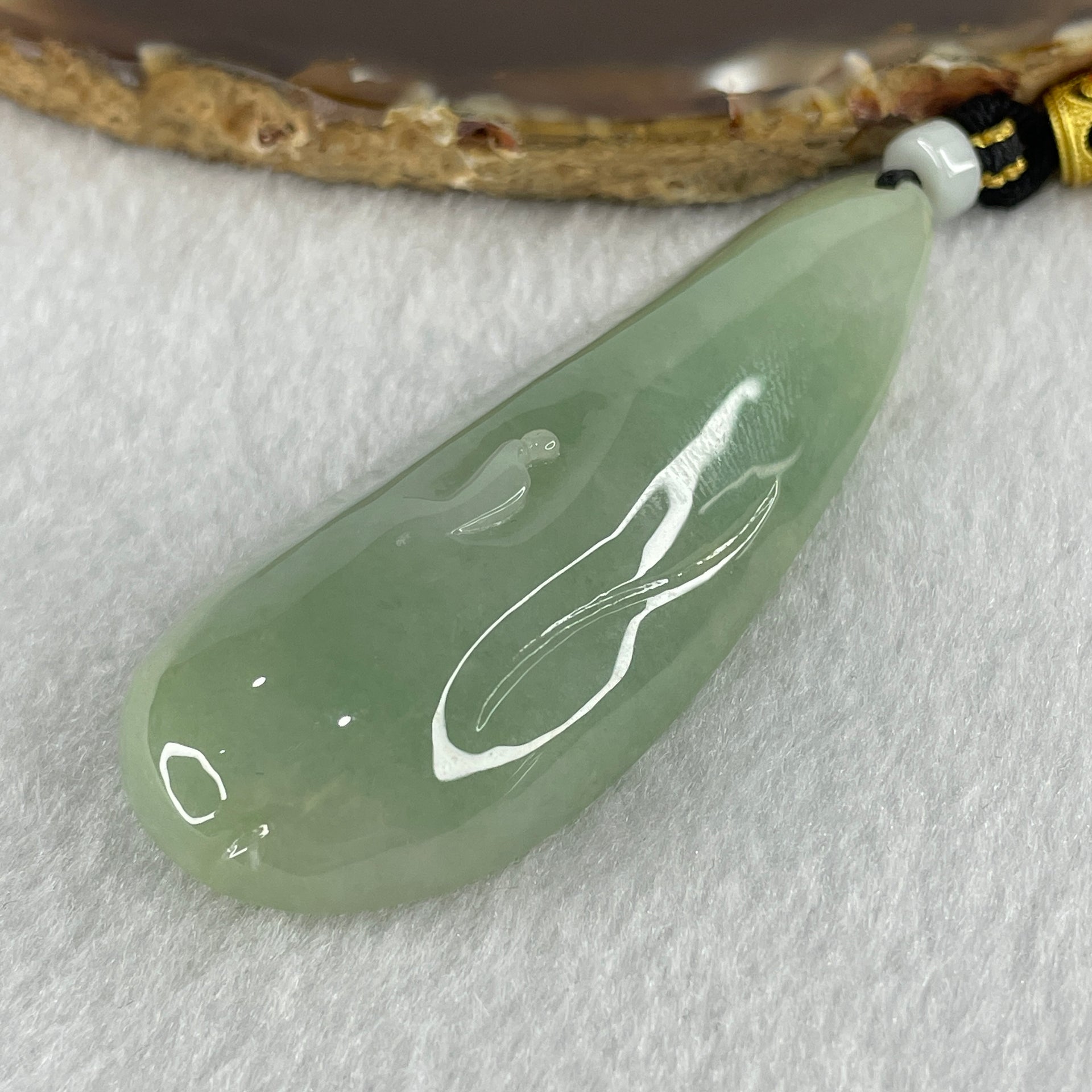 Natural Type A Light Green Jadeite People Seeking for Enlightenment Pendant 48.13g 70.6 by 28.5 by 13.8mm - Huangs Jadeite and Jewelry Pte Ltd