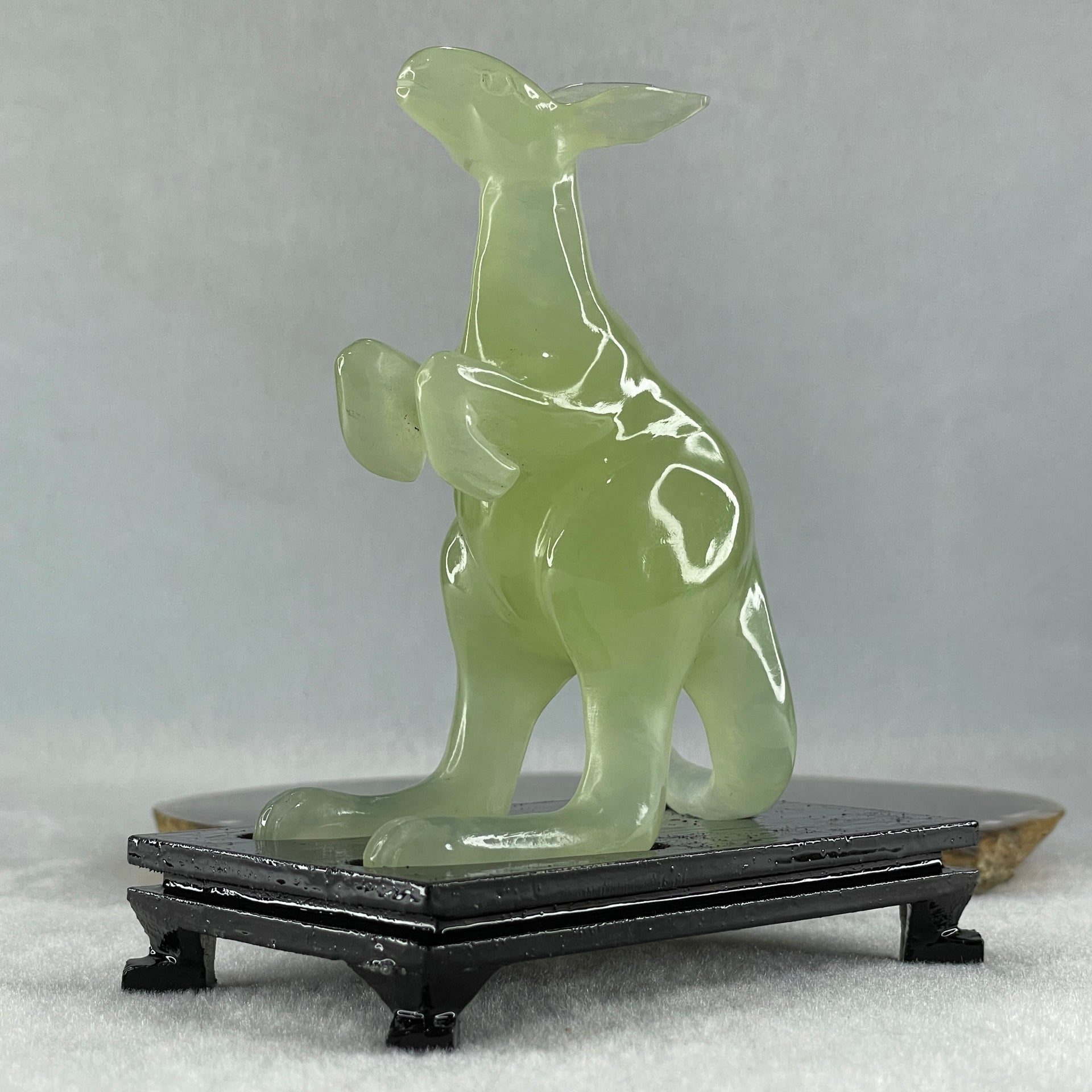 Natural Green Serpentine Kangaroo with Wooden Stand Display 172.6g 100.8 by 63.0 by 115.0mm - Huangs Jadeite and Jewelry Pte Ltd