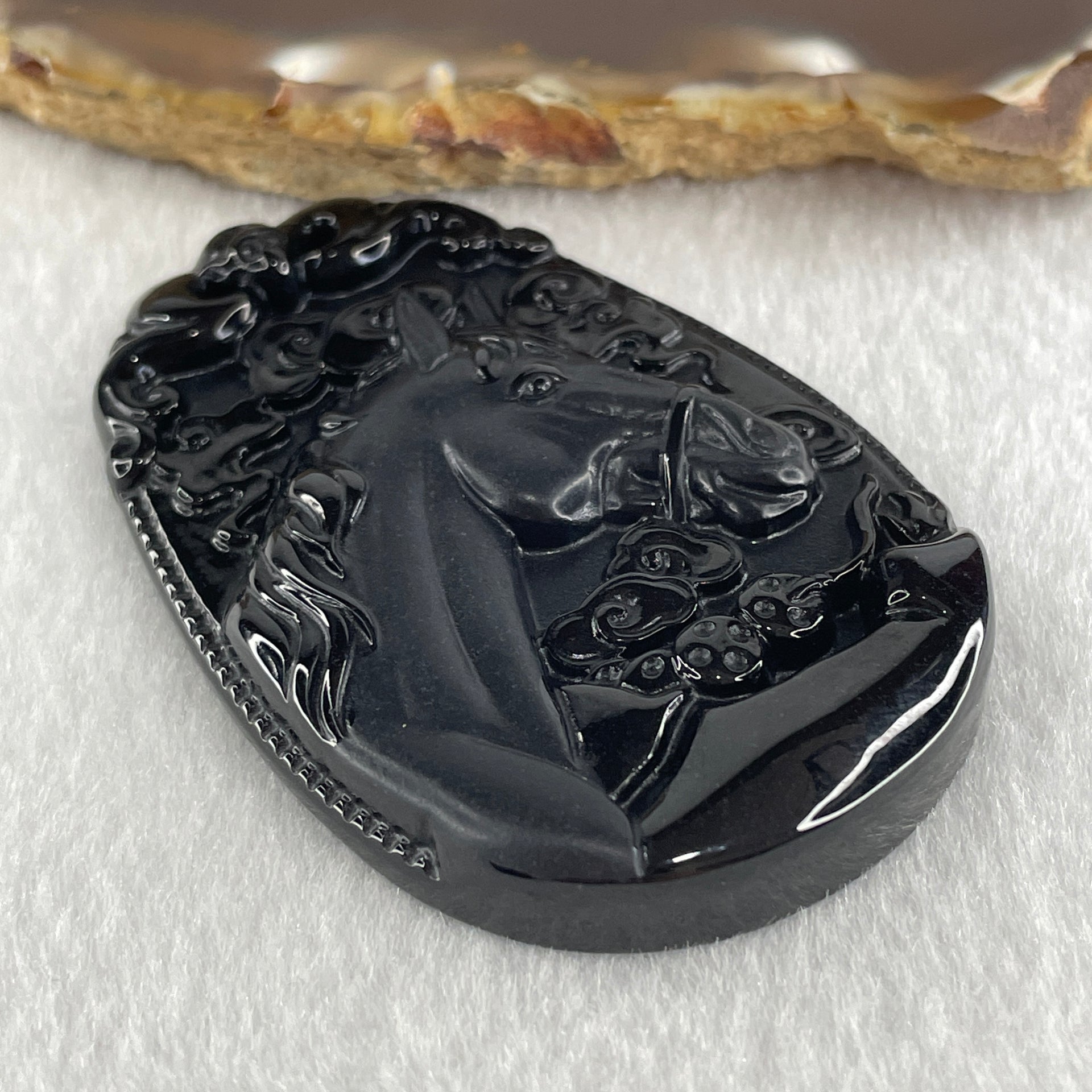 Type A Opaque to Partial Translucent Black Omphacite Jadeite Horse Pendant 23.64g 60.1 by 40.1 by 8.4mm - Huangs Jadeite and Jewelry Pte Ltd