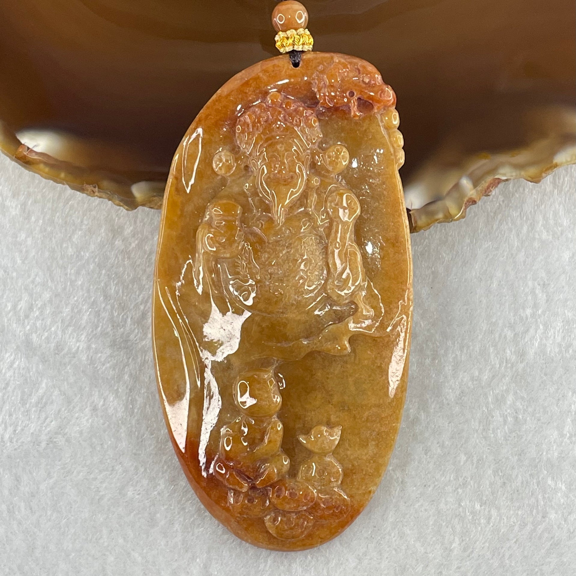 Grandmaster Type A Brown with Reddish  Patches Jadeite Cai Shen with Tong Zi Ingot and Dragon  Pendant 吉星高照 48.68g 76 by 39.7 by 6.3mm - Huangs Jadeite and Jewelry Pte Ltd