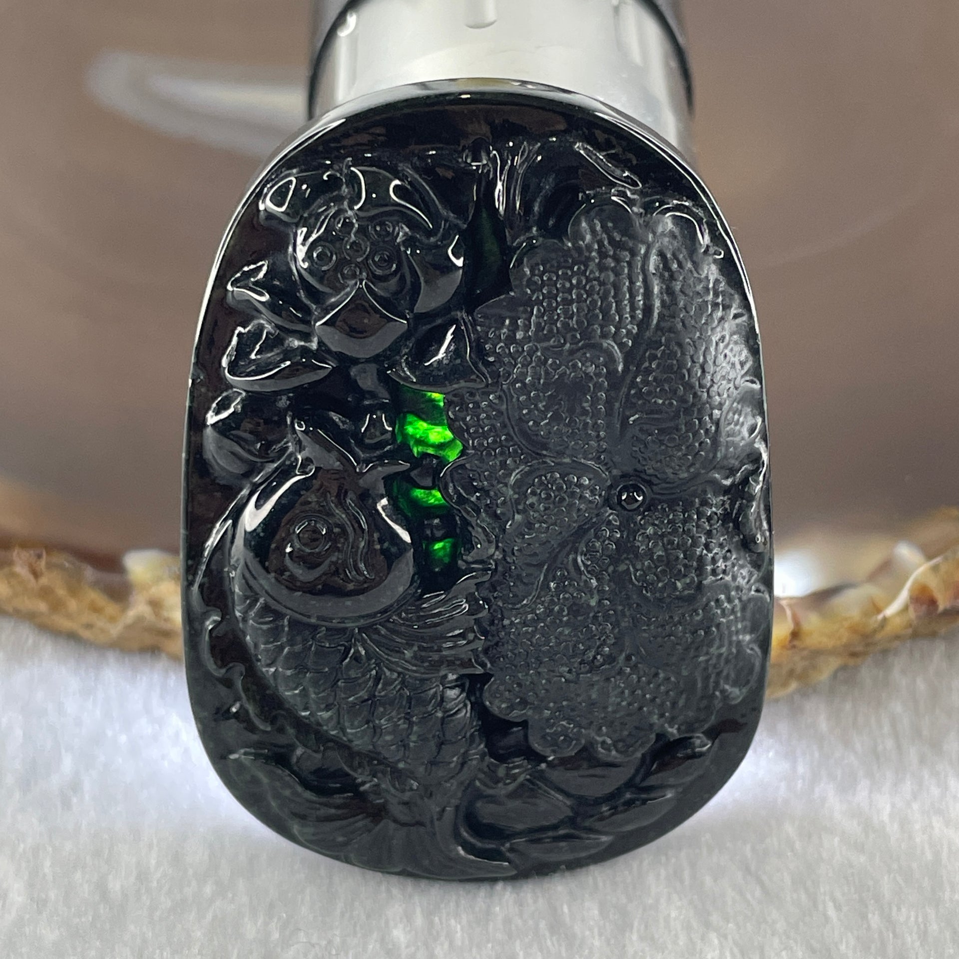 Type A Opaque to Partial Translucent Black Omphacite Jadeite Fish with Lotus Flower and Leaf Pendant 24.60g 51.1 by 35.9 by 8.8mm - Huangs Jadeite and Jewelry Pte Ltd