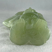 Natural Green Serpentine Stand Laughing Milo Buddha with Wealth Pot with Wooden Stand Display 1,599.3g 140.0 by 90.0 by 270.0mm - Huangs Jadeite and Jewelry Pte Ltd