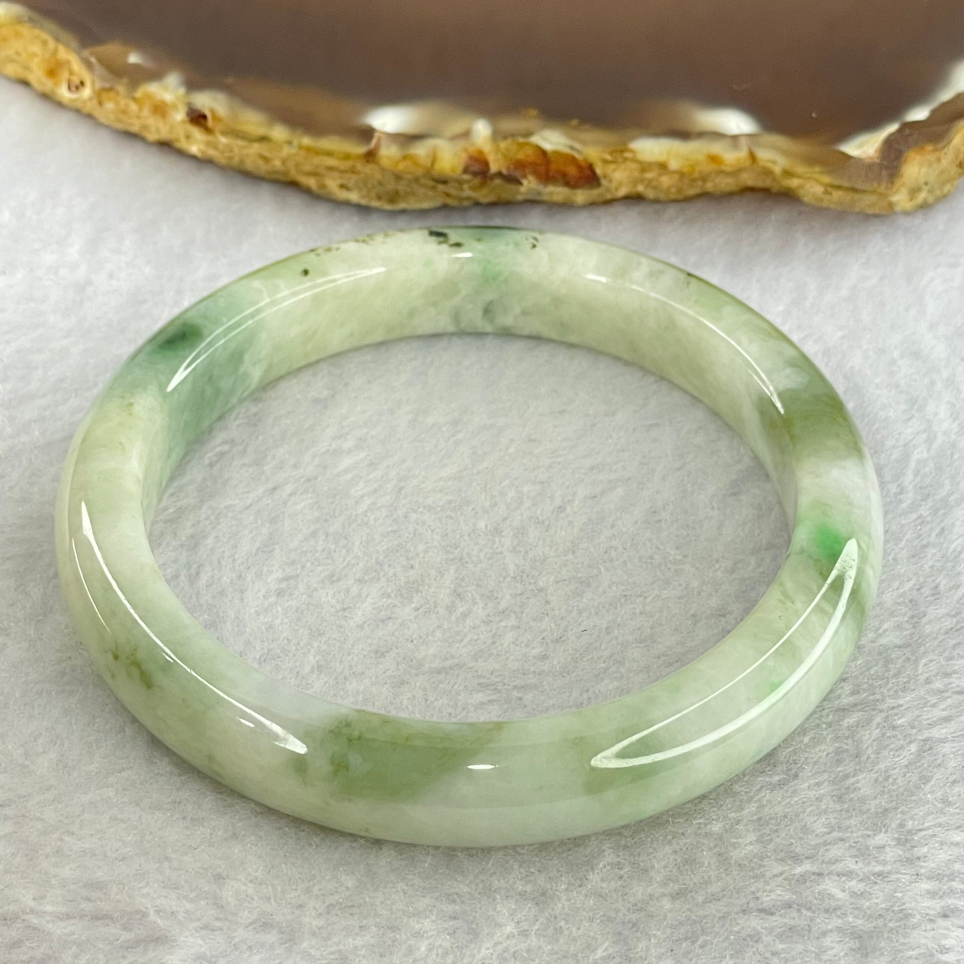 Type A Light Green with Moss Green Piao Hua Jadeite Bangle Internal Diameter 55.6mm 41.97g 10.4 by 7.6mm ( Very Slight External Rough + Internal Lines) - Huangs Jadeite and Jewelry Pte Ltd
