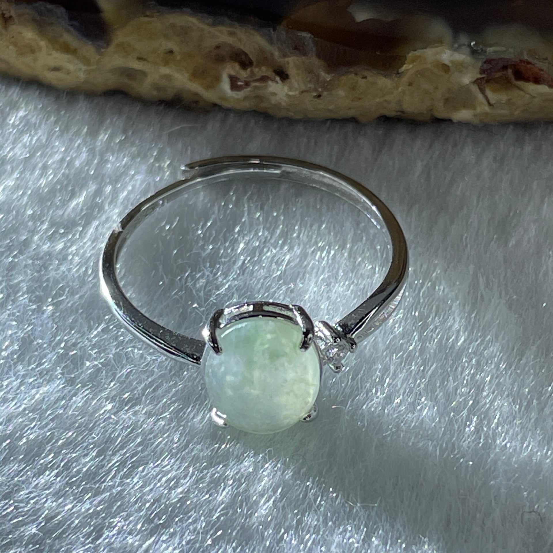 Natural Type A Semi Icy Faint Green Jadeite Oval Shape Cabouchon in S925 Silver Ring (Adjustable Size) 1.18g 8.8 by 6.4 by 3.0mm - Huangs Jadeite and Jewelry Pte Ltd