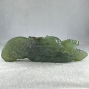Natural Green Serpentine Siting Milo Buddha with Coin with Wooden Stand Display 1014.8g 200.0 by 100.0 by 105.0mm - Huangs Jadeite and Jewelry Pte Ltd