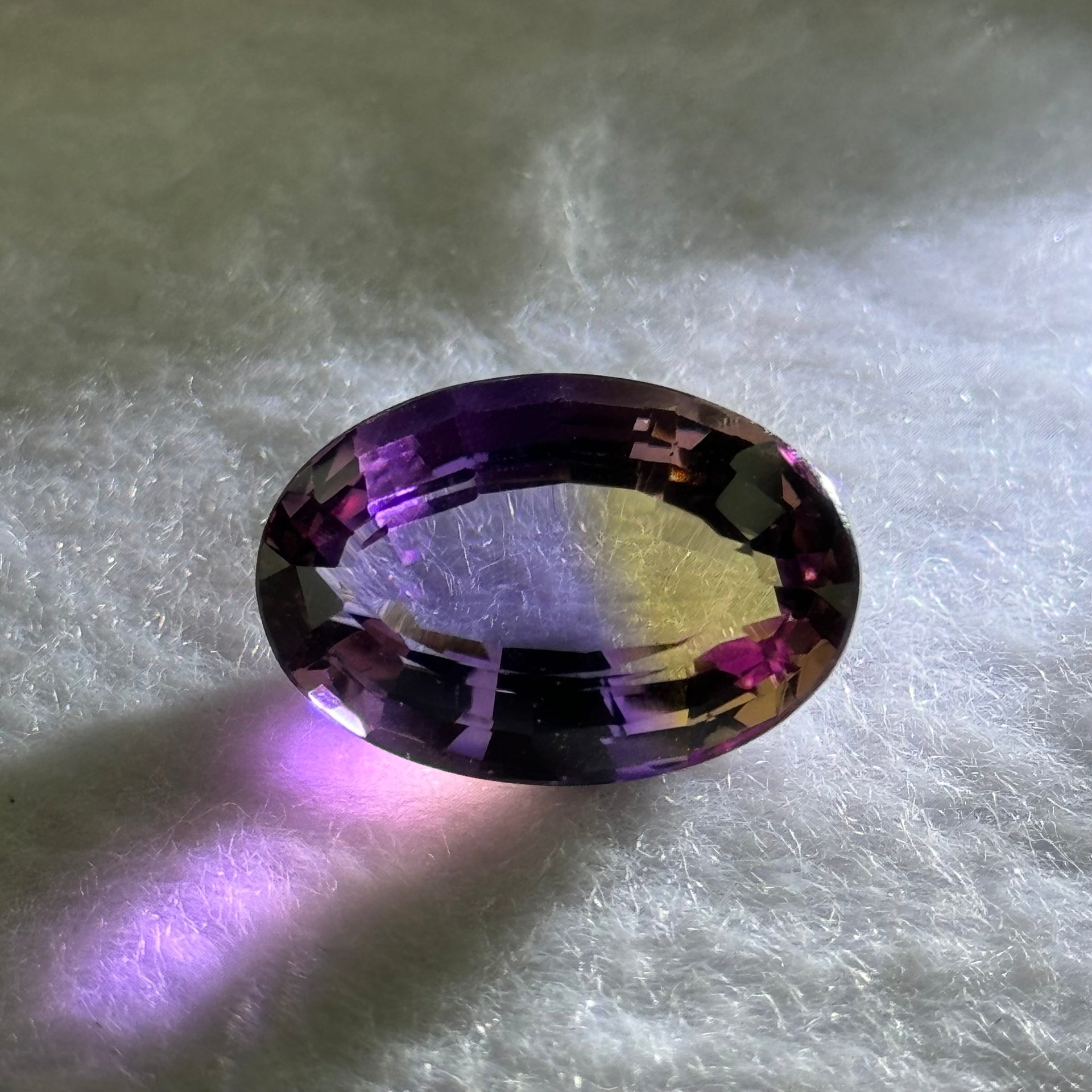 Natural Faceted Ametrine Oval Shape 17.62ct 19.7 by 13.5 by 10.0mm - Huangs Jadeite and Jewelry Pte Ltd