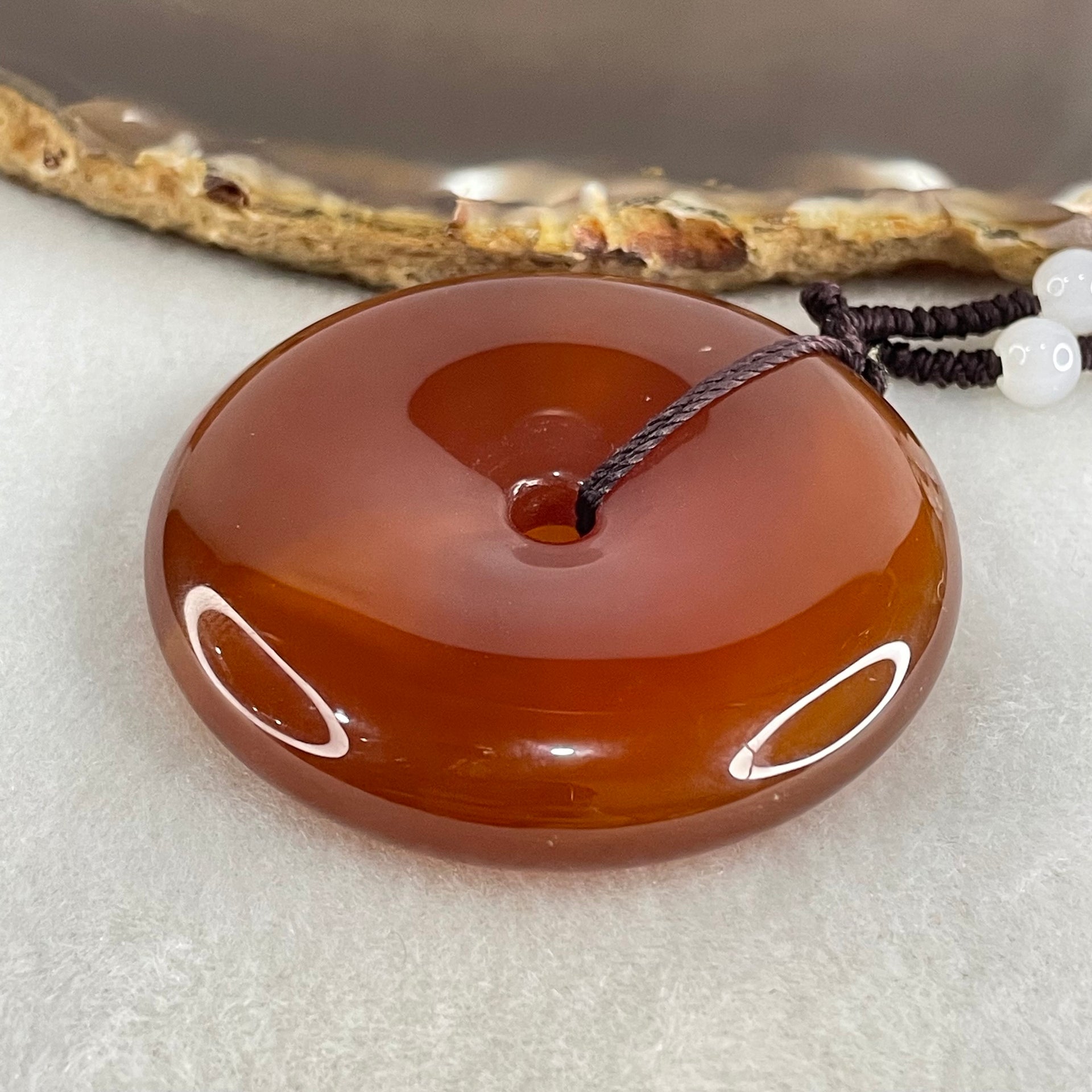 Natural Red Chalcedony Ping An Kou Donut 55.771g 52.6 by 11.2mm with White Crystal Beads Necklace 60cm - Huangs Jadeite and Jewelry Pte Ltd