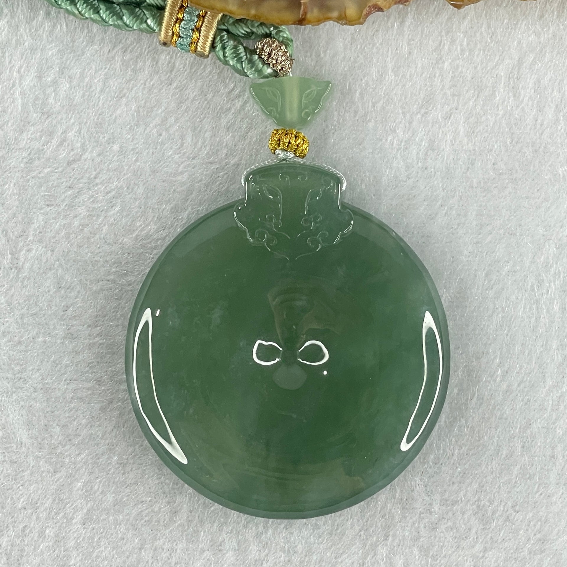 Gold Award Grand Master Type A Icy Bluesish Green Ping An Kou with Mystical Beast Jadeite Pendant 35.90g 43.8 by 8.0mm - Huangs Jadeite and Jewelry Pte Ltd