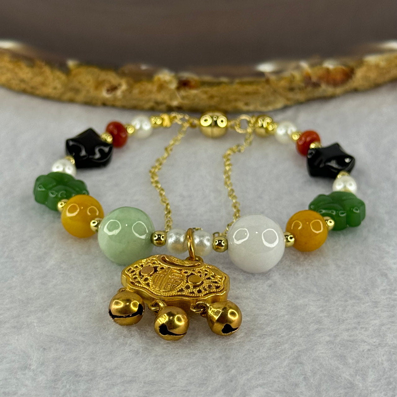 Type A Green and Lavender Jadeite Beads with Crystal Clover, Longevity Lock, Crystal Beads Charms in Sliver Gold Color Bracelet 15.80g (Adjustable size) 10.7mm 2 Beads 10.5 by 4.9mm 2 Black 2 Green - Huangs Jadeite and Jewelry Pte Ltd